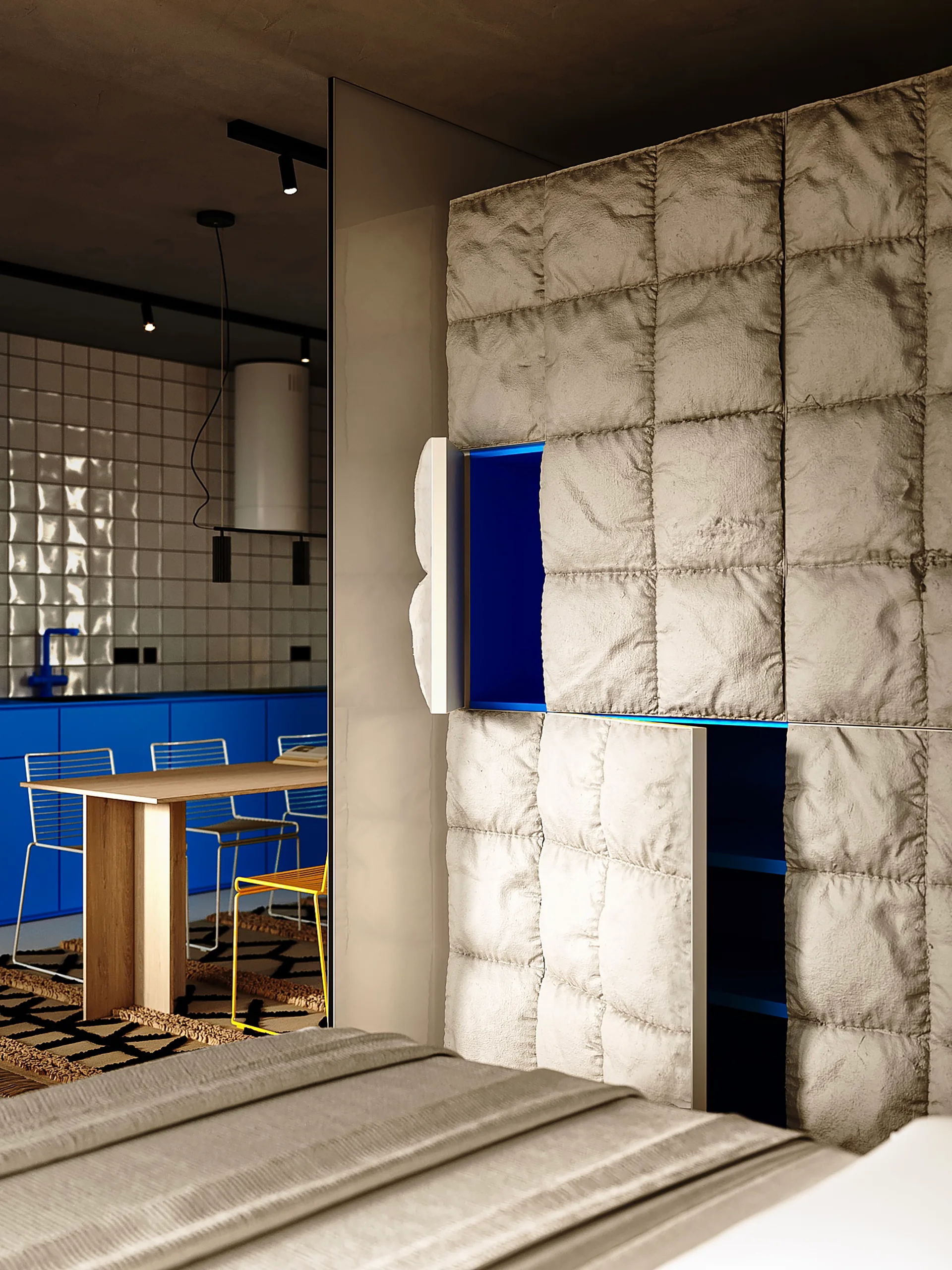 A modern room featuring a beige quilted storage cabinet with doors open to reveal a bright blue interior next to a kitchen in the background.