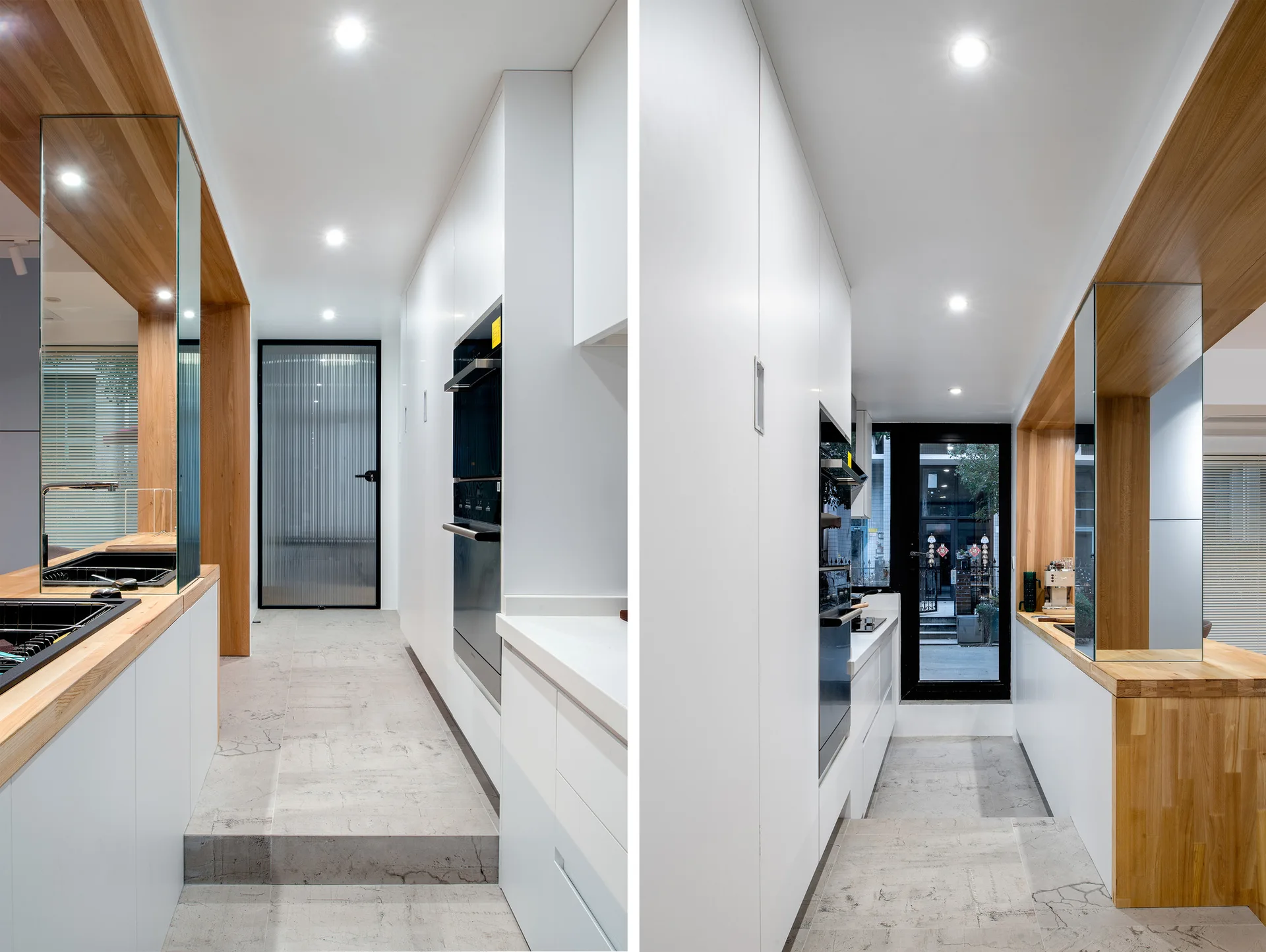 A split-view image of a modern kitchen featuring white floor-to-ceiling cabinets, warm wood counters, a sunken stone floor, and integrated appliances.