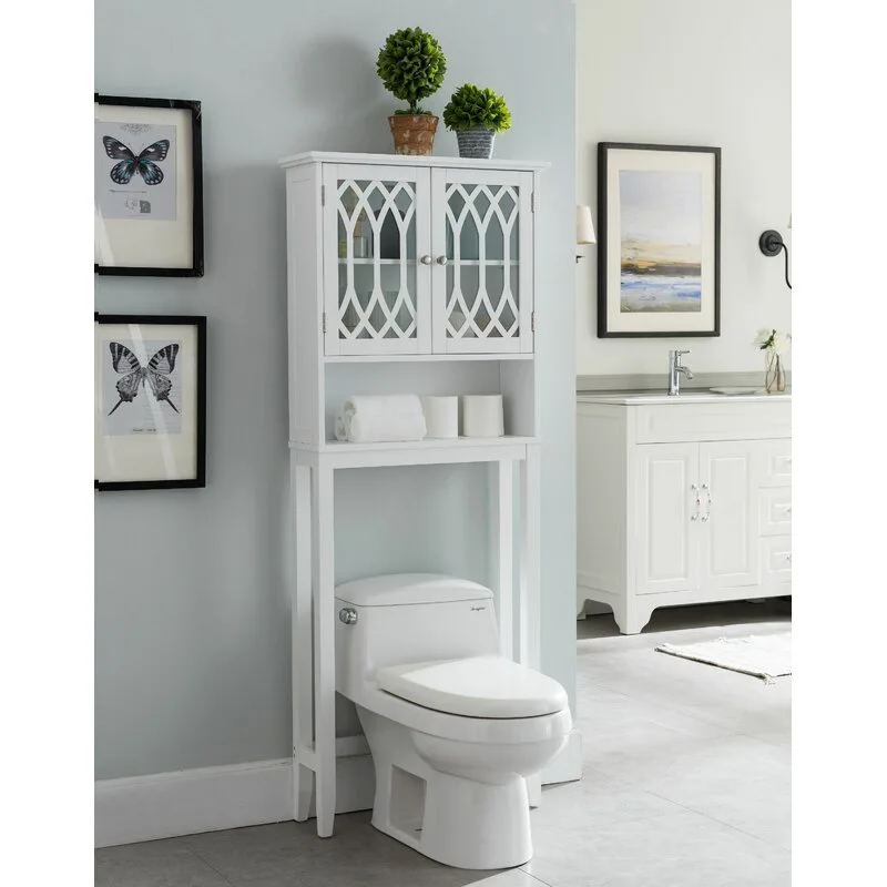 A white over-the-toilet storage unit with lattice glass doors stands over a ceramic toilet in a light blue bathroom.