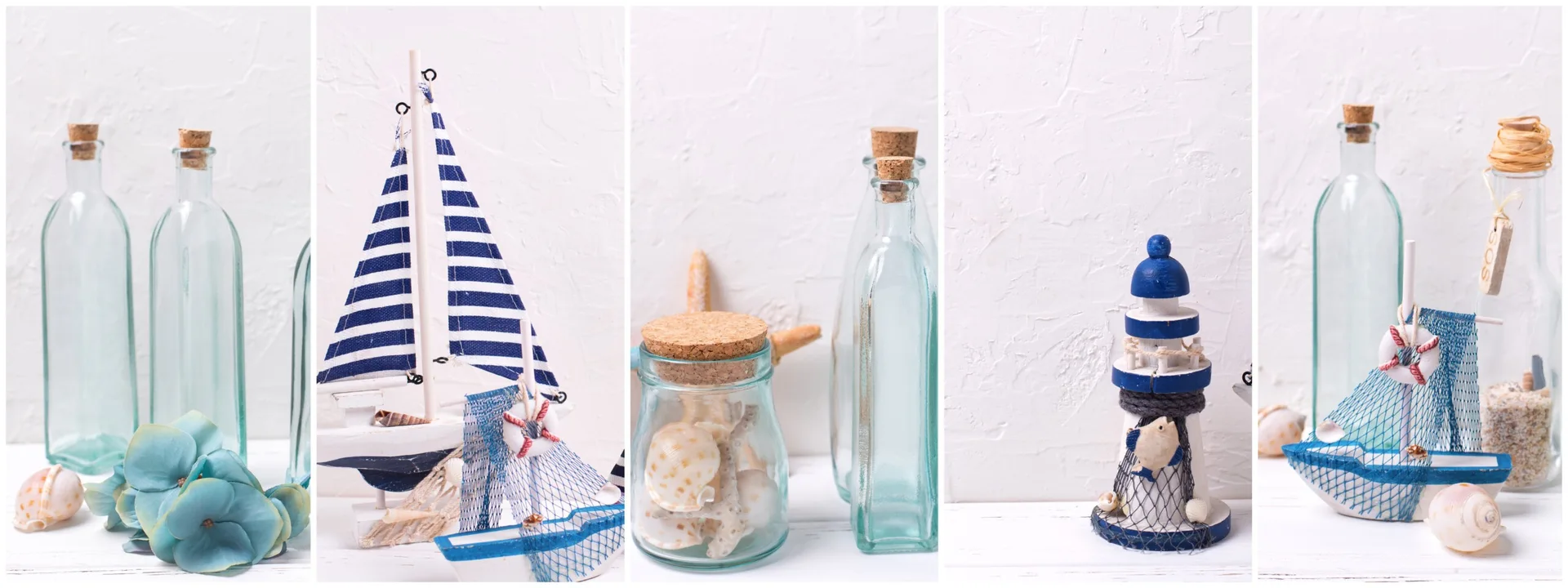 A composite display of coastal tabletop decorations, including blue and white model ships, a miniature lighthouse, sea shells, and glass bottles.