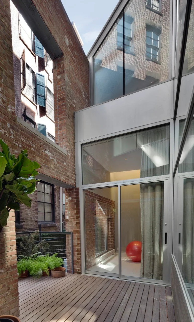 White Street Loft, WORKac, Windows, Brick, Facade, Chair, Handrail, Courtyard