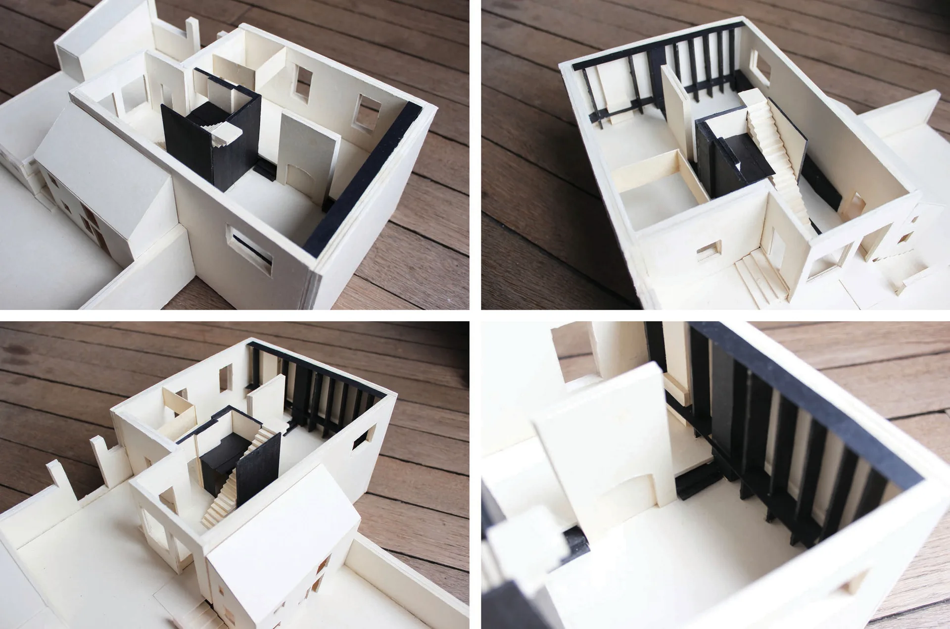 Four overhead views of a physical white and black architectural scale model displaying interior partitions, window cutouts, and a miniature staircase.