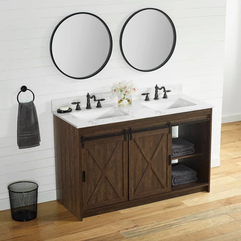 A rustic dark wood double vanity with sliding barn doors and a white marble top is positioned against a white shiplap wall.