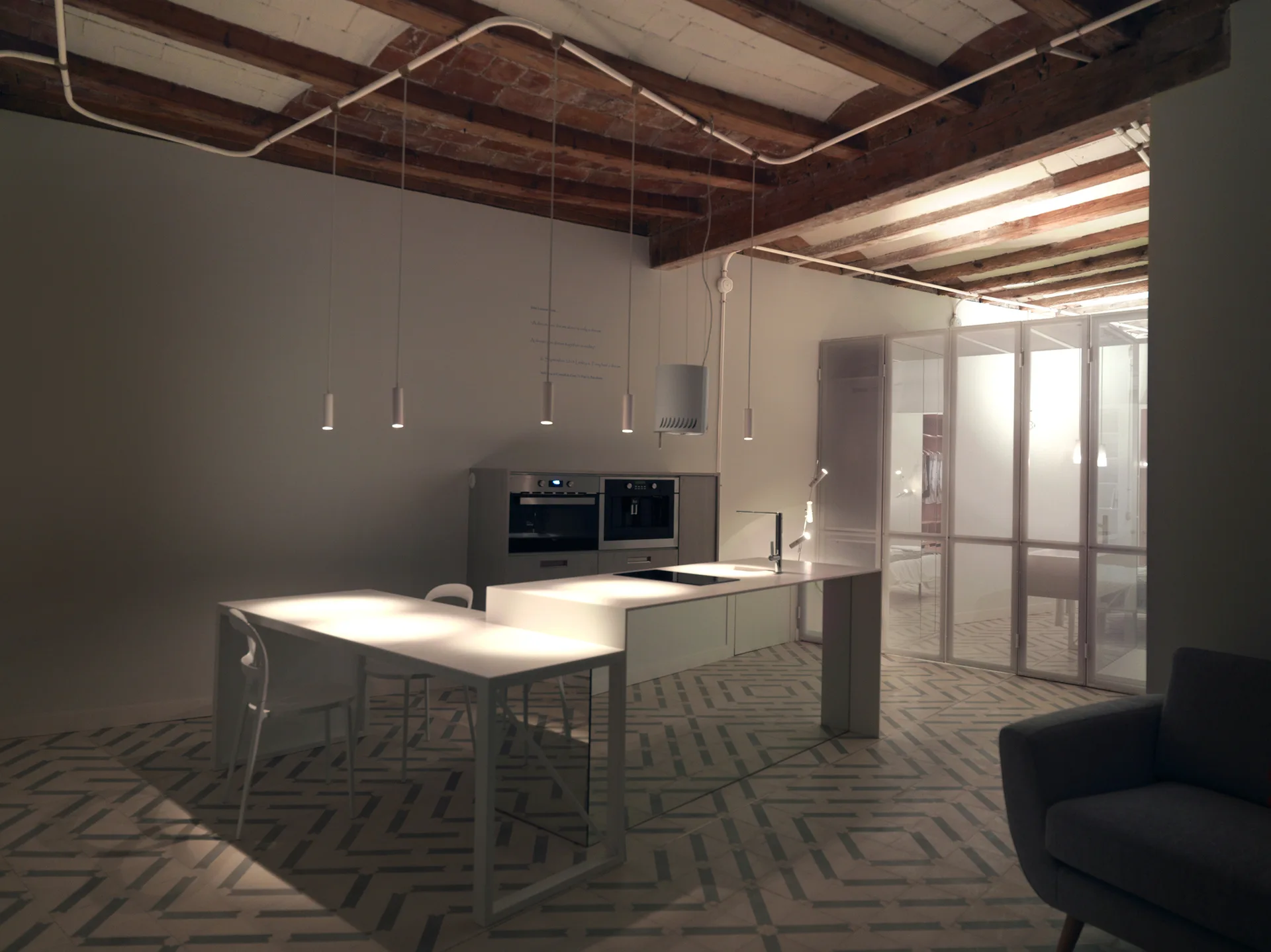A minimalist kitchen features a white island and dining table, cylindrical pendant lights, and geometric floor tiles under an exposed brick ceiling.
