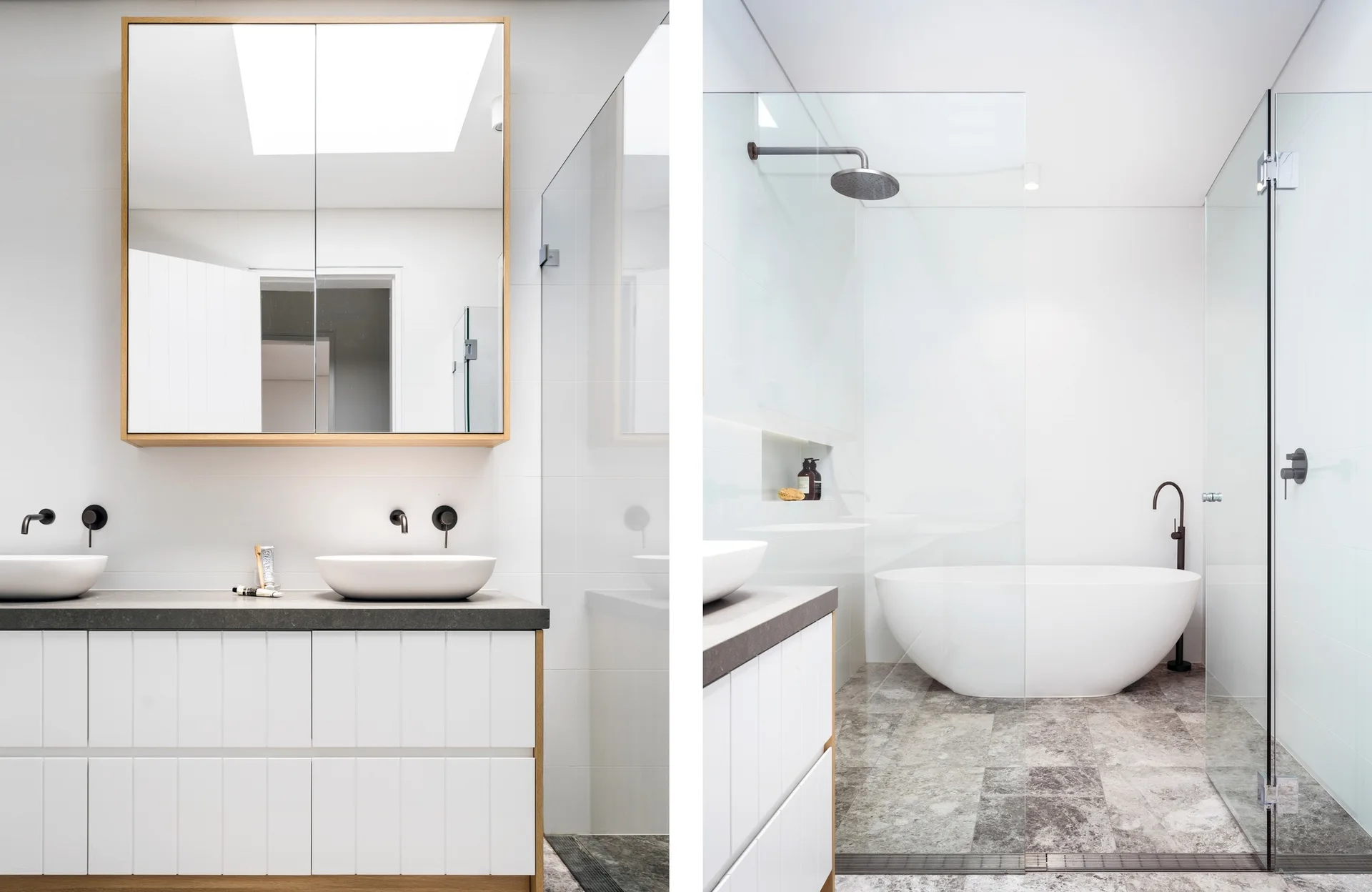 A modern minimalist bathroom features a double vanity with two vessel sinks, a wood-framed mirror cabinet, and a freestanding white bathtub.