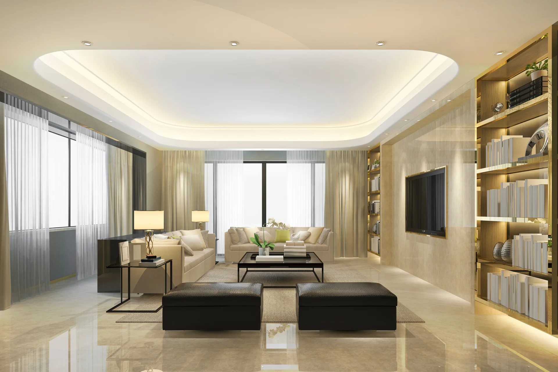 A spacious contemporary living room features beige sofas, black leather ottomans, a marble-clad wall with a TV, and glowing built-in shelves.