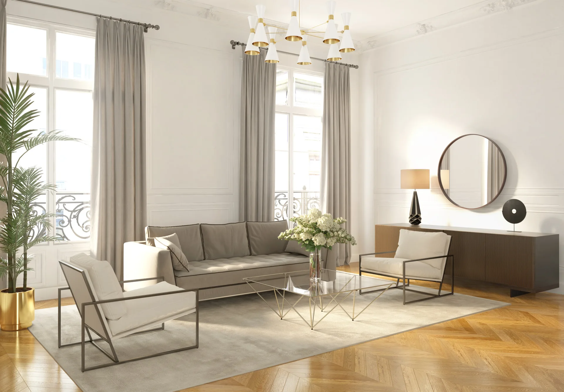 A bright living room features a taupe sofa, white armchairs, a geometric glass coffee table, and a slatted sideboard beneath a round mirror.