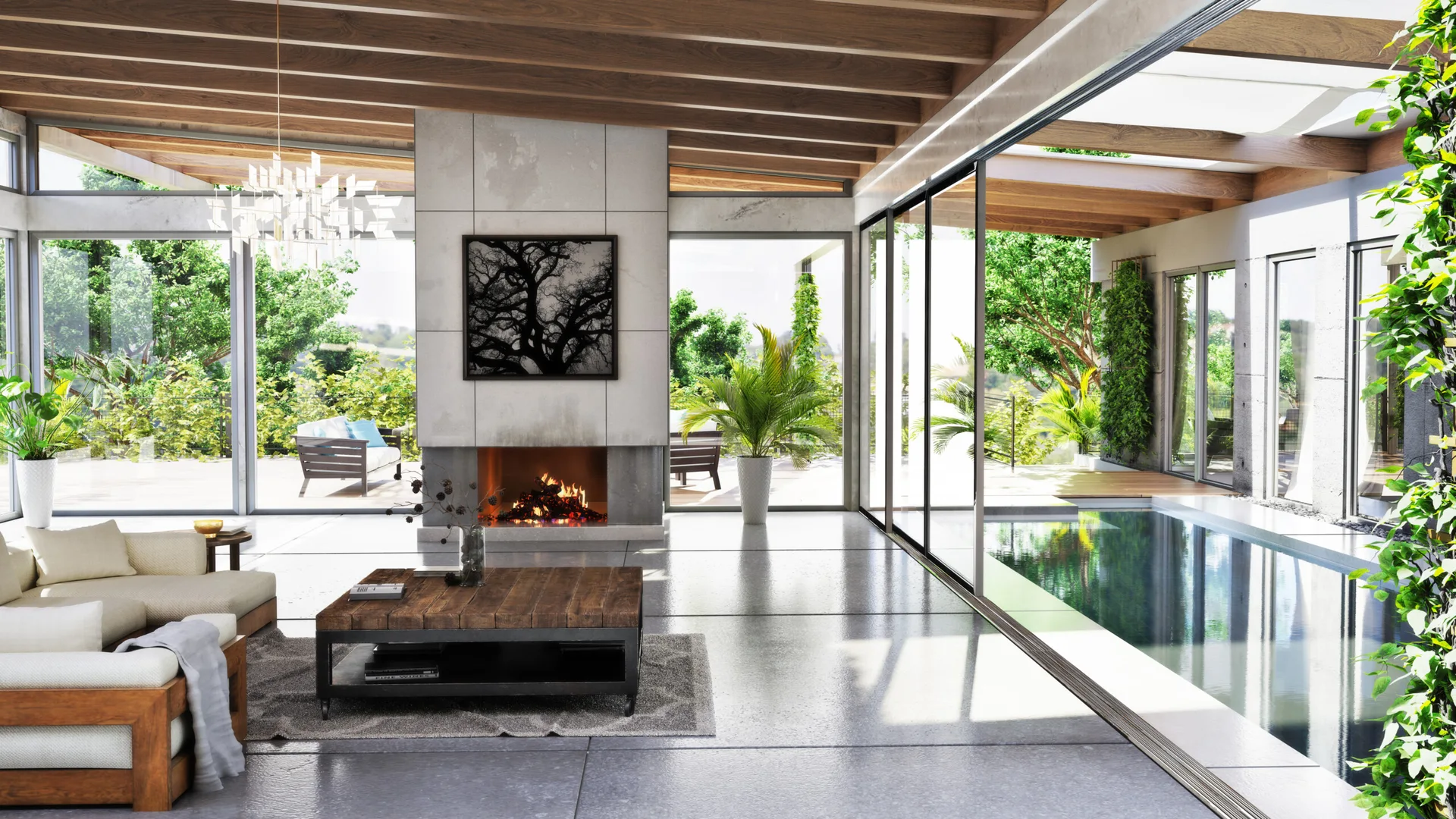 A modern open-plan living room with a concrete fireplace, wood-beamed ceiling, and sliding glass doors opening to an indoor pool.