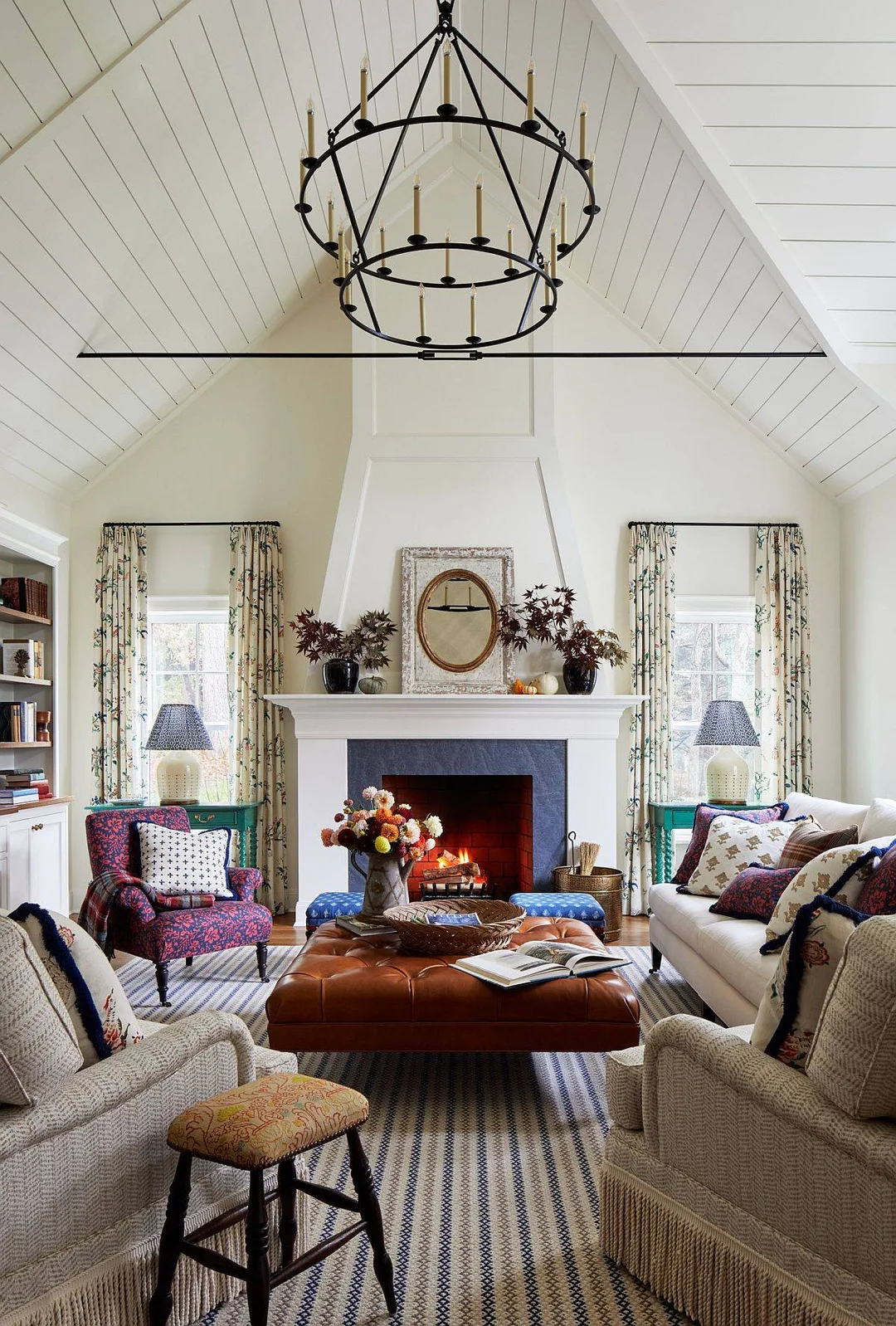 Modern farmhouse living room with angled high ceiling&nbsp;