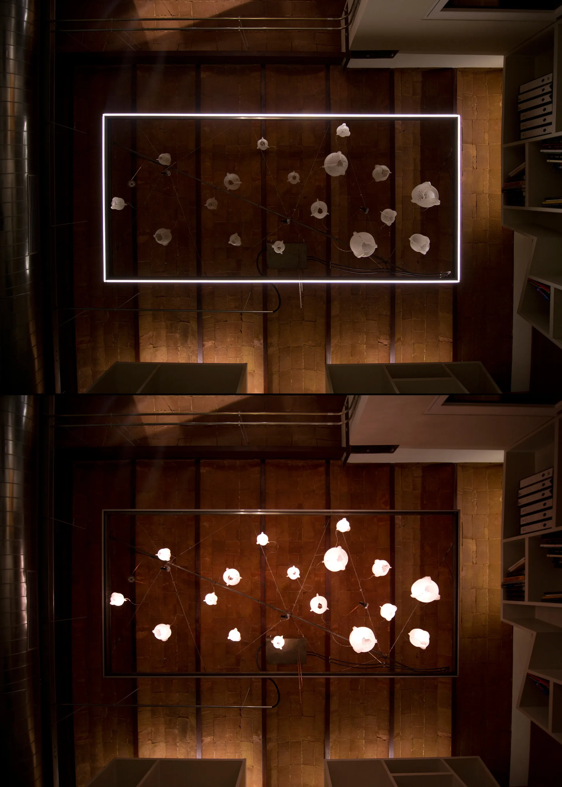 A split view showing a rectangular ceiling light fixture with illuminated glass orbs suspended against an exposed brick ceiling.