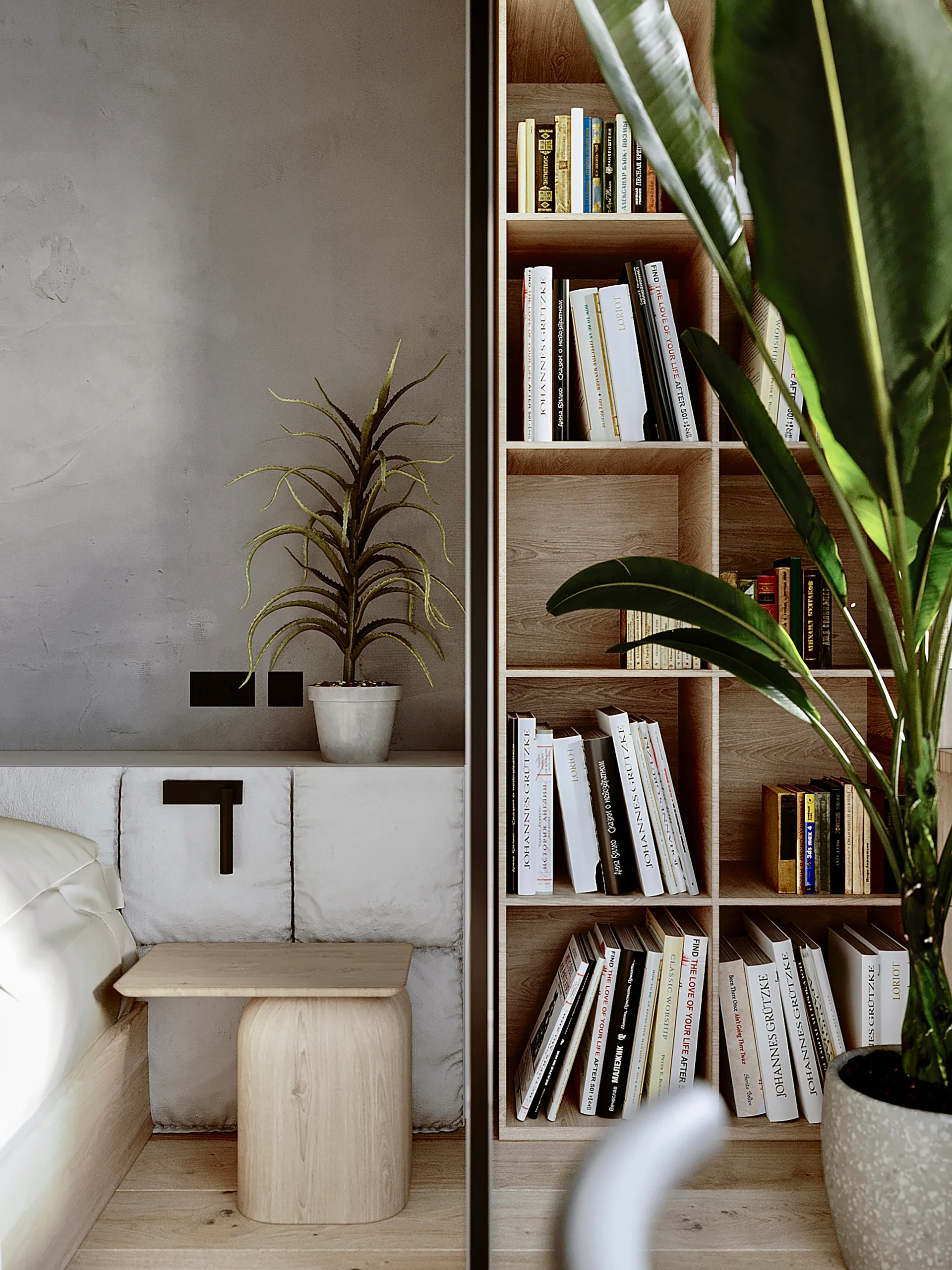 A minimalist bedroom features a built-in wooden bookshelf filled with books next to a textured grey wall, a light wood nightstand, and potted green plants.