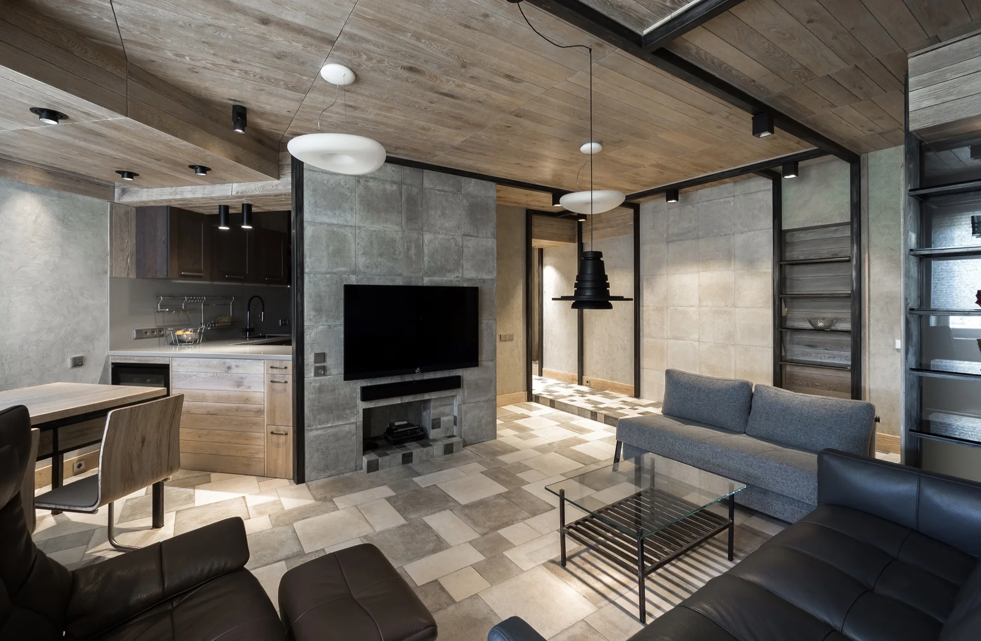 A modern living area with a wood-plank ceiling, black metal framing, and a stone-tile accent wall featuring a mounted television.