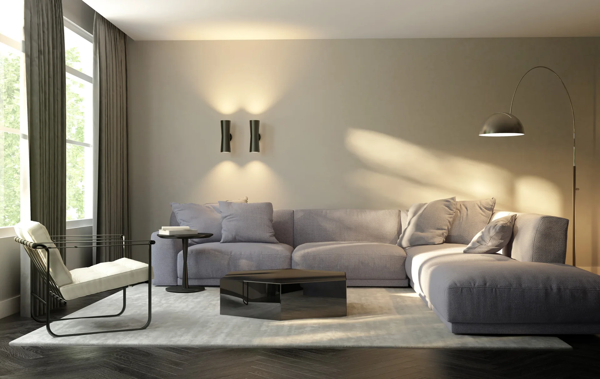 A modern living room features a grey sectional sofa, a black hexagonal coffee table, and an arc floor lamp over dark herringbone wood floors.
