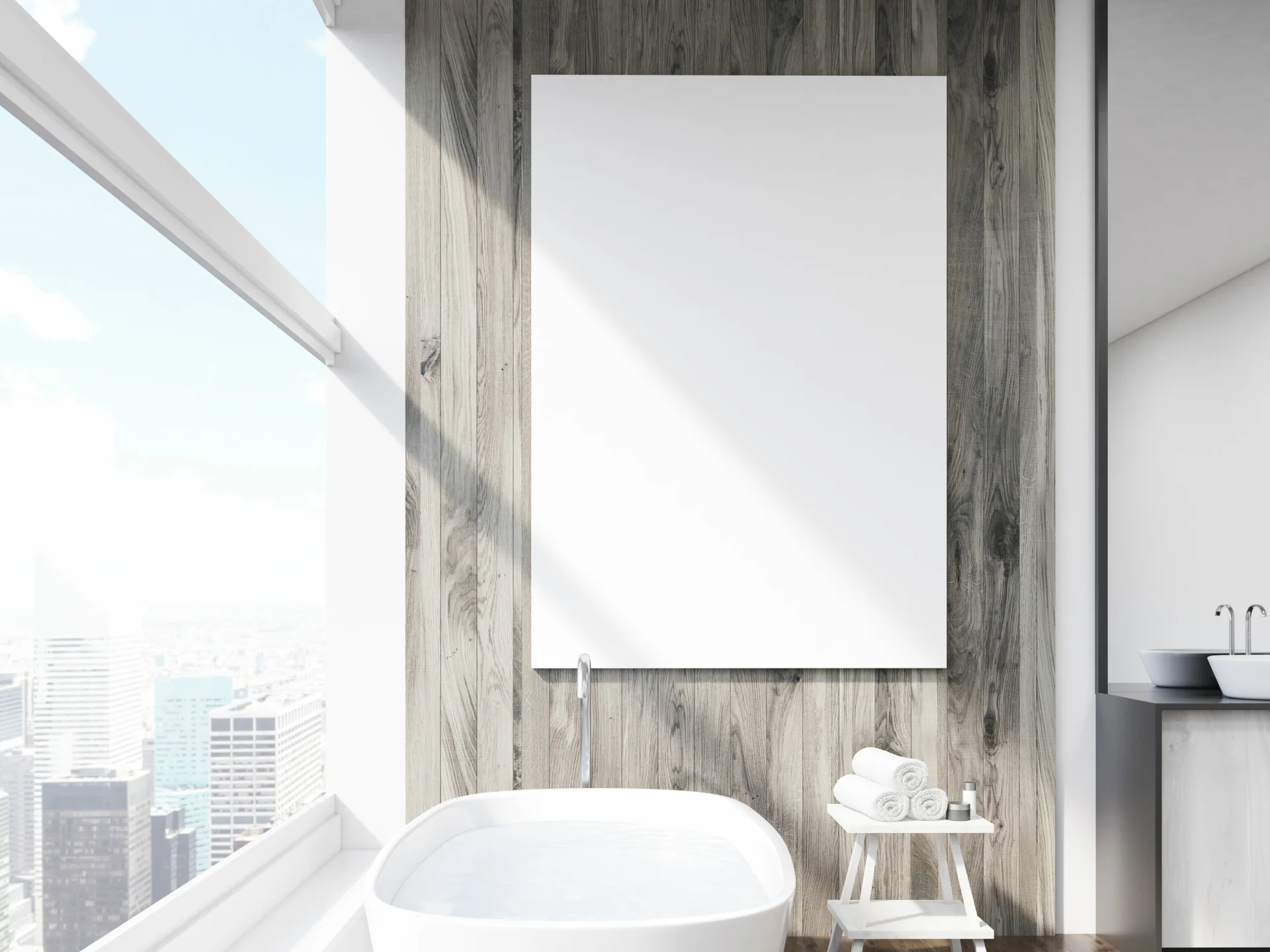 A modern bathroom features a freestanding white bathtub set against a gray wood-paneled wall next to a large window overlooking a city skyline.