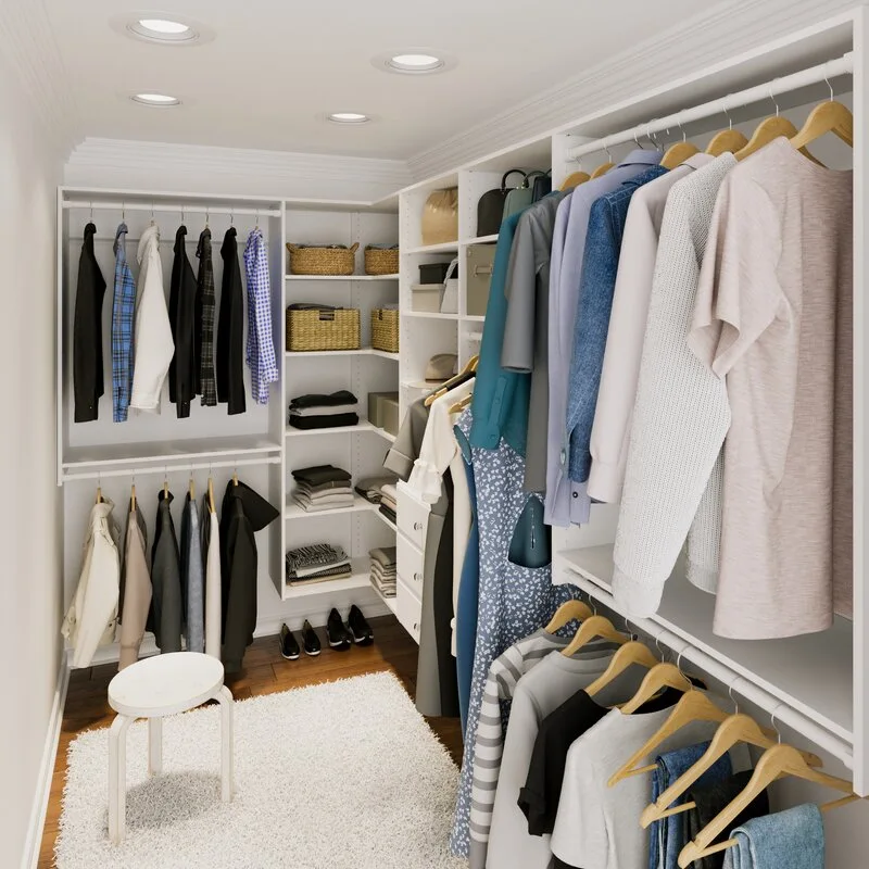 A white walk-in closet featuring built-in shelving, organized hanging clothes on wooden hangers, woven baskets, and a white shag rug.