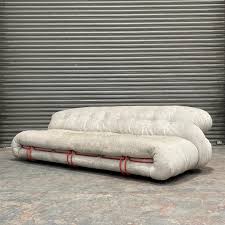 Soriana Cream Tufted Sofa with Red Metal Accents