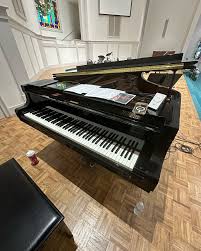 Yamaha Polished Black Grand Piano