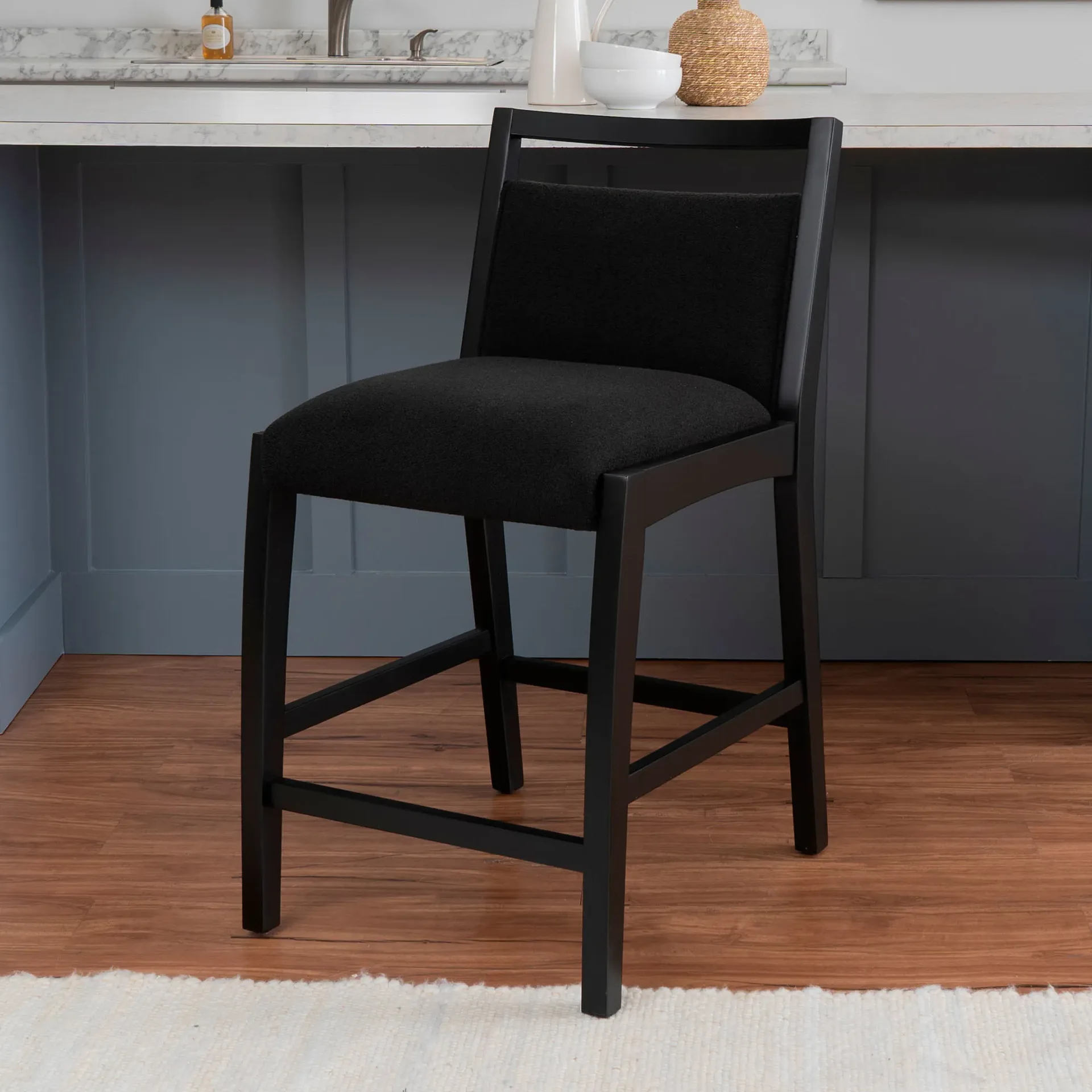 Sylvester Black Upholstered Wood Counter Stool