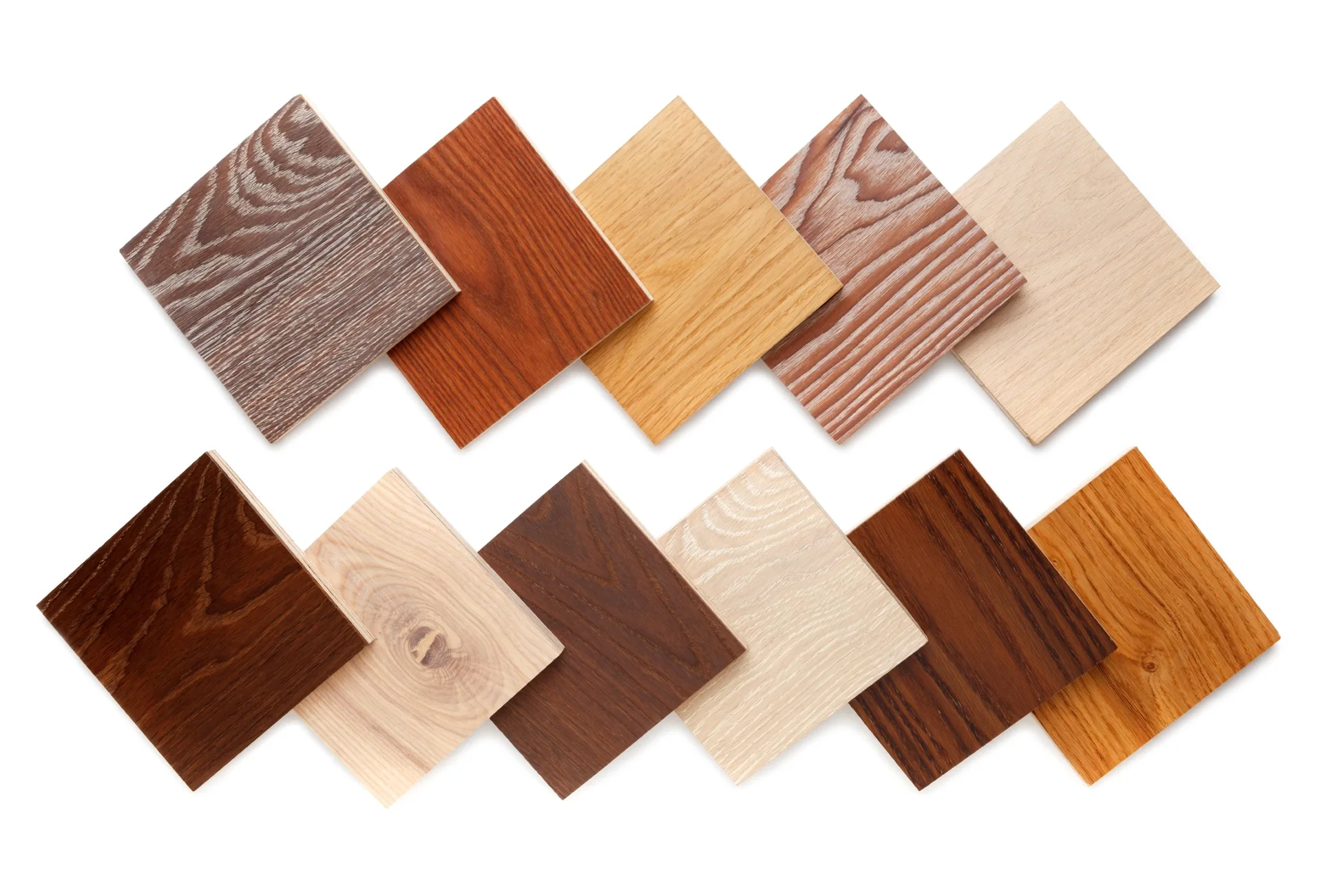 Eleven square wood flooring samples of various light and dark brown shades and grain patterns are arranged in two rows against a white background.