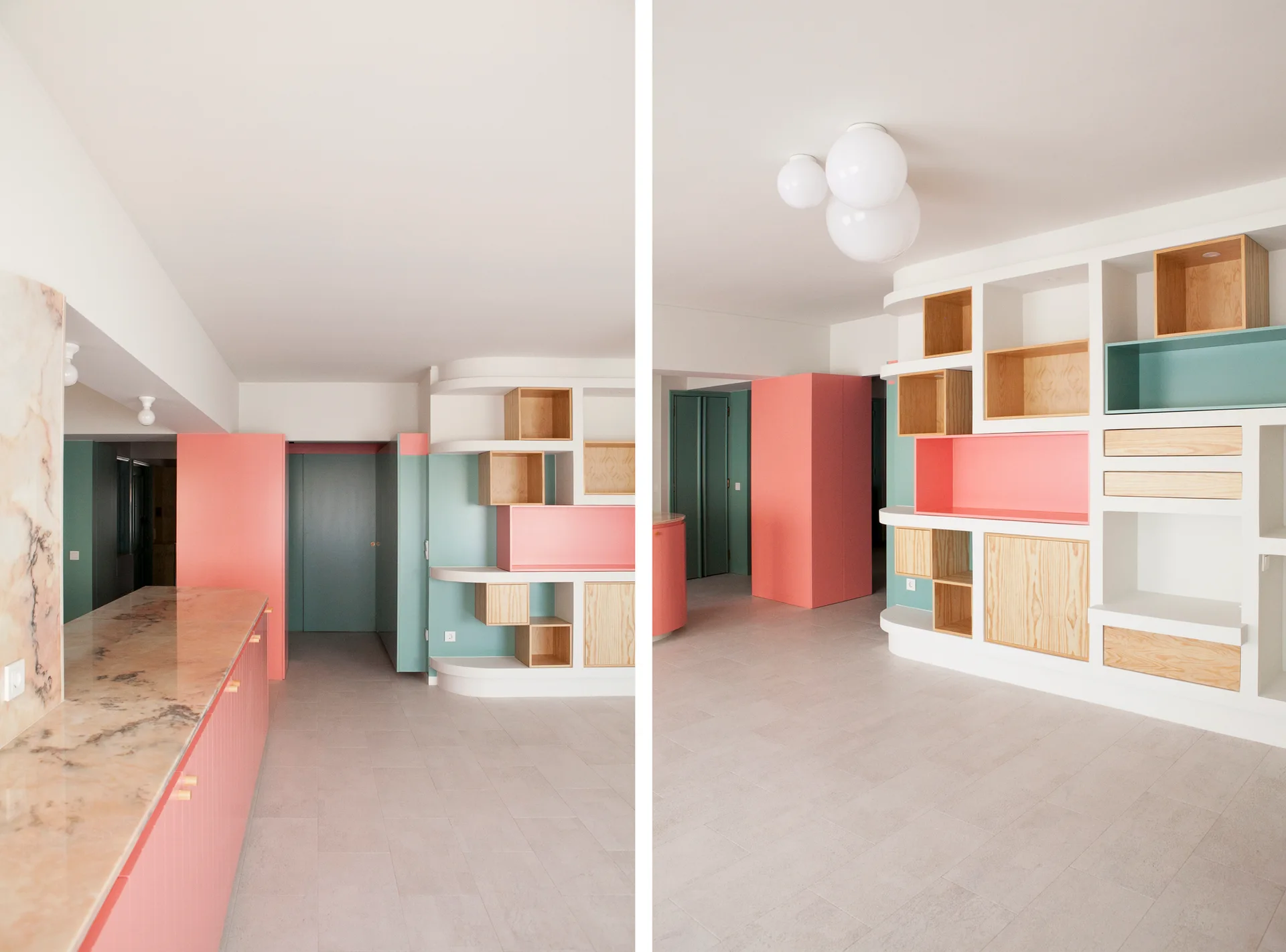 A modern interior featuring a large white built-in storage unit with pink, teal, and natural wood cubbies next to a pink-based kitchen counter.