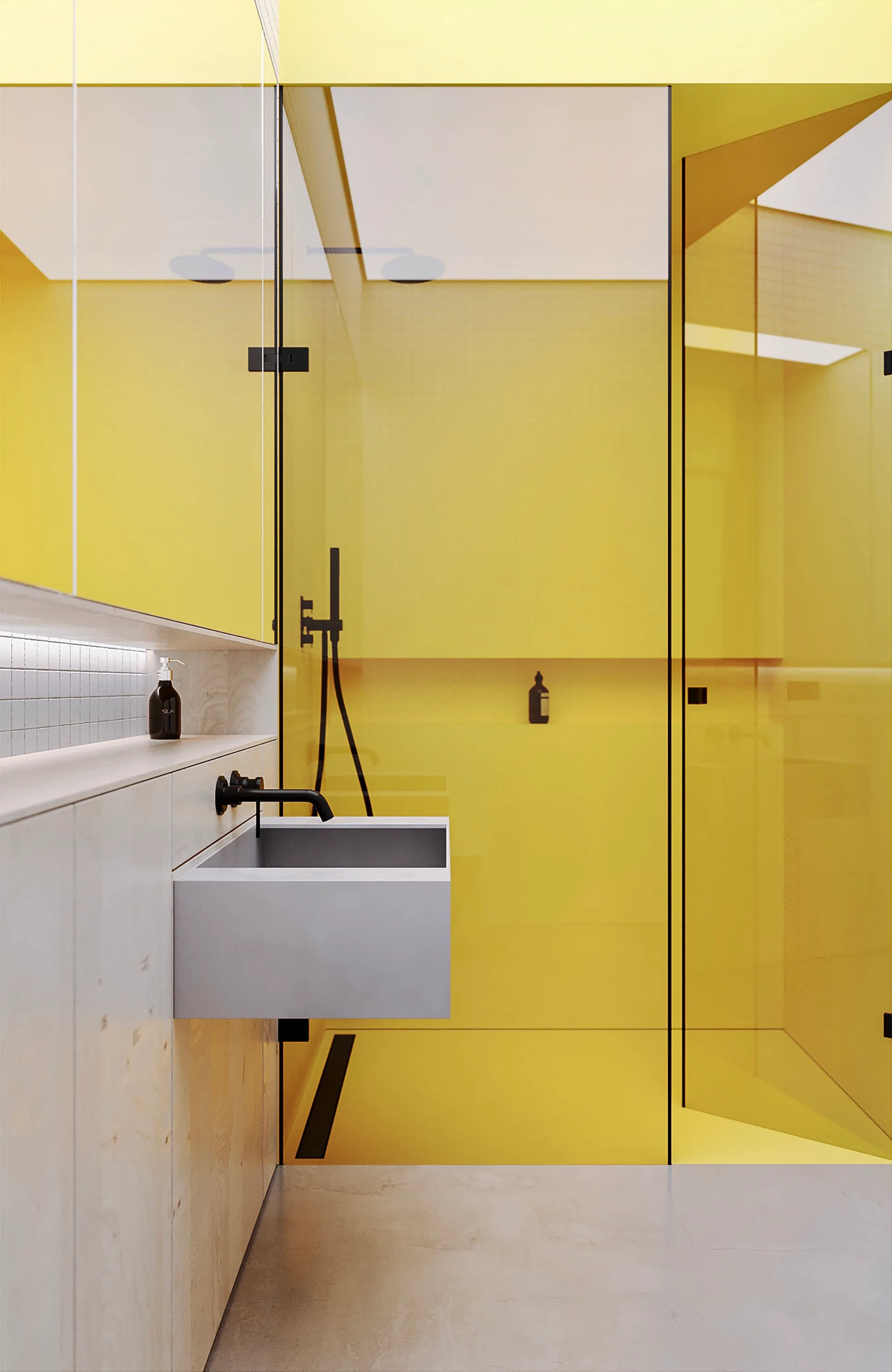 A modern bathroom featuring a wall-mounted grey concrete sink, a matte black faucet, and translucent yellow glass shower partitions.
