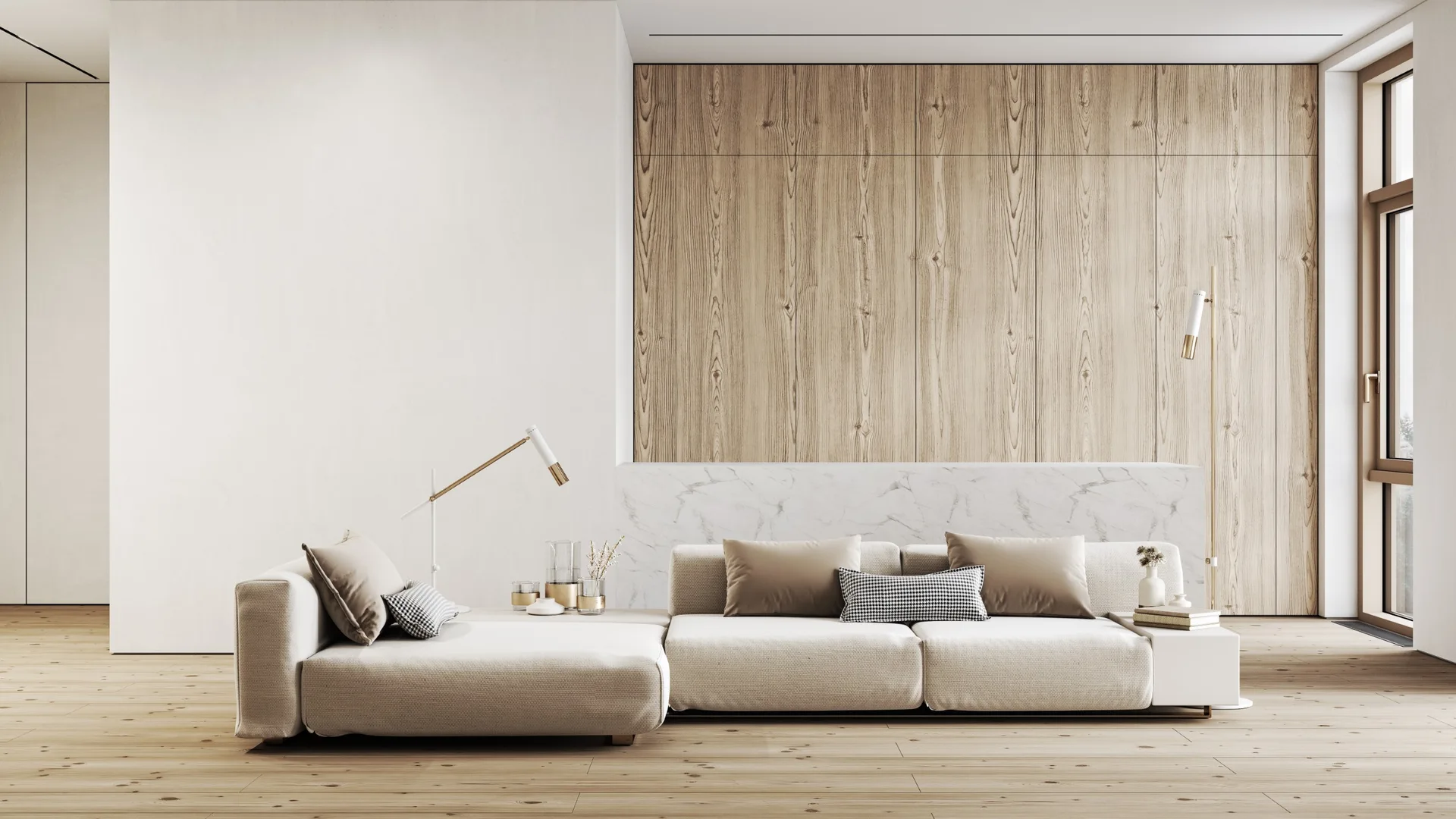 A low-profile cream sofa rests on light wood flooring in front of a vertical wood-paneled accent wall with a marble ledge.