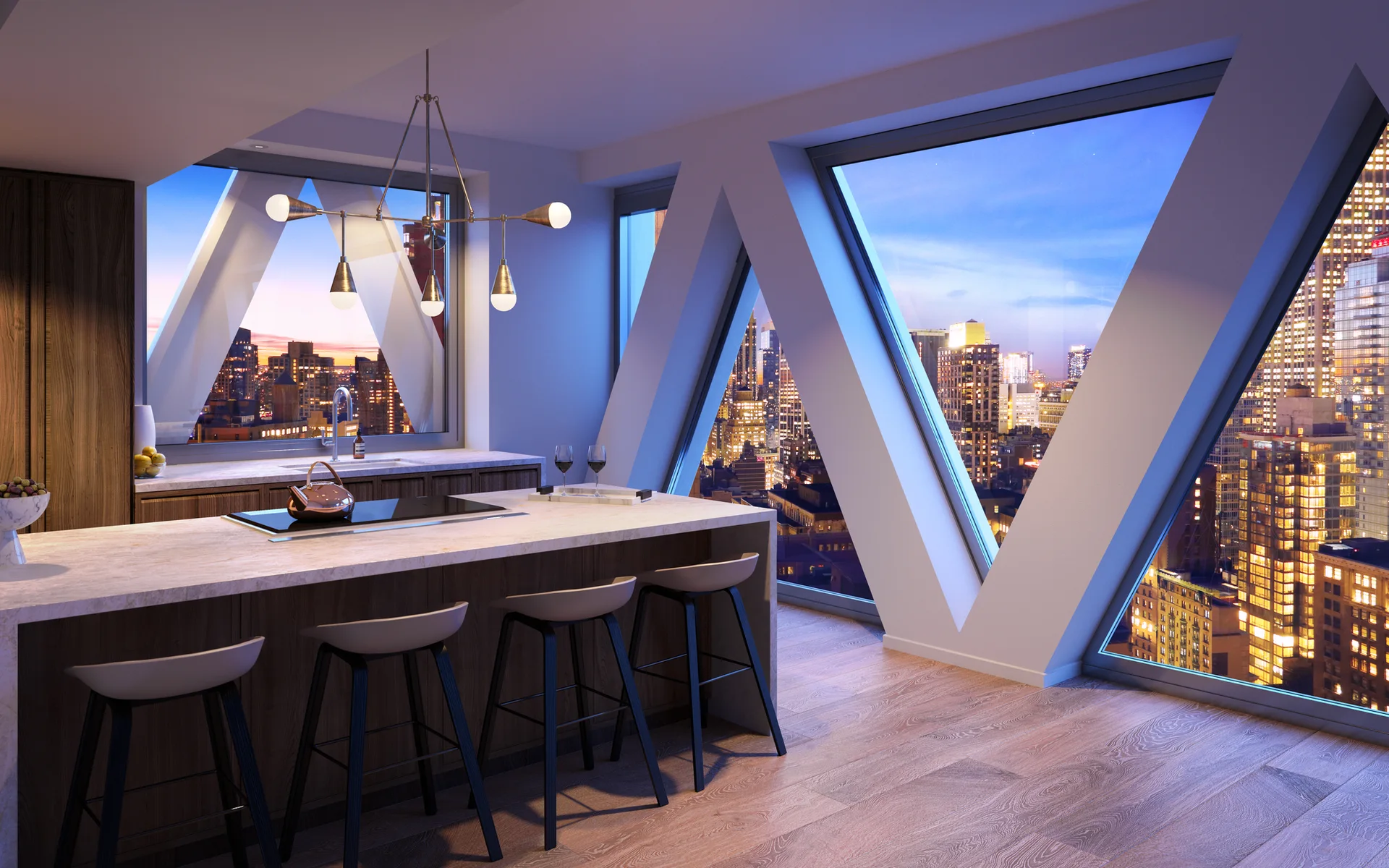 A modern kitchen features a stone-topped island with bar stools set against unique V-shaped windows showcasing a nighttime city skyline.