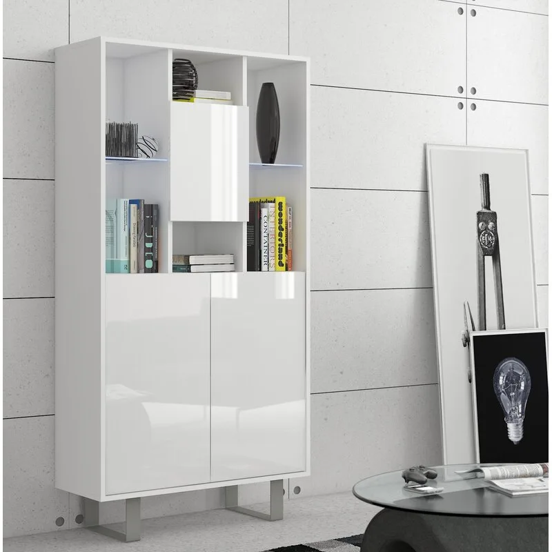 A modern, high-gloss white cabinet with asymmetrical open shelving, glass accents, and closed doors stands against a light gray paneled wall.