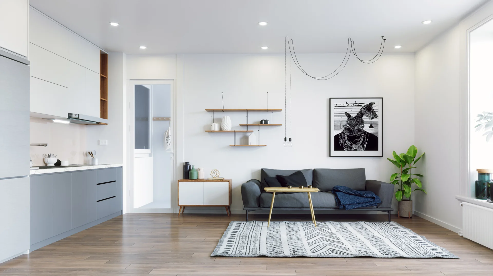 An open-plan living room features a grey sofa, staggered wooden shelves, a geometric rug, and a modern grey kitchen in the background.