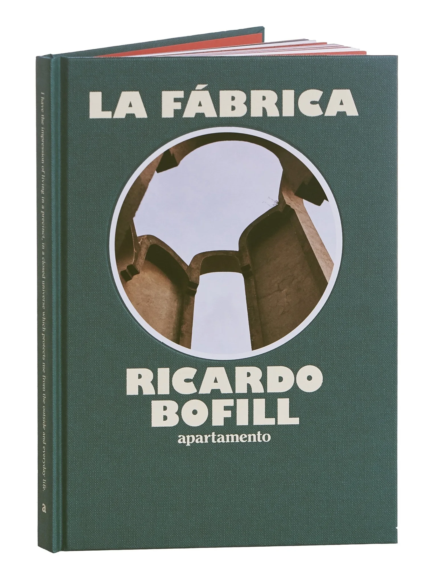 A green fabric hardcover book titled La Fabrica by Ricardo Bofill featuring a circular photo of concrete architectural arches.