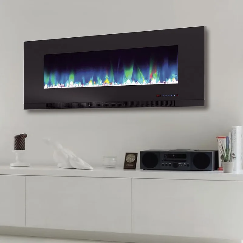 A modern black electric fireplace with colorful flames is mounted on a light wall above a long white sideboard displaying decor and a stereo.