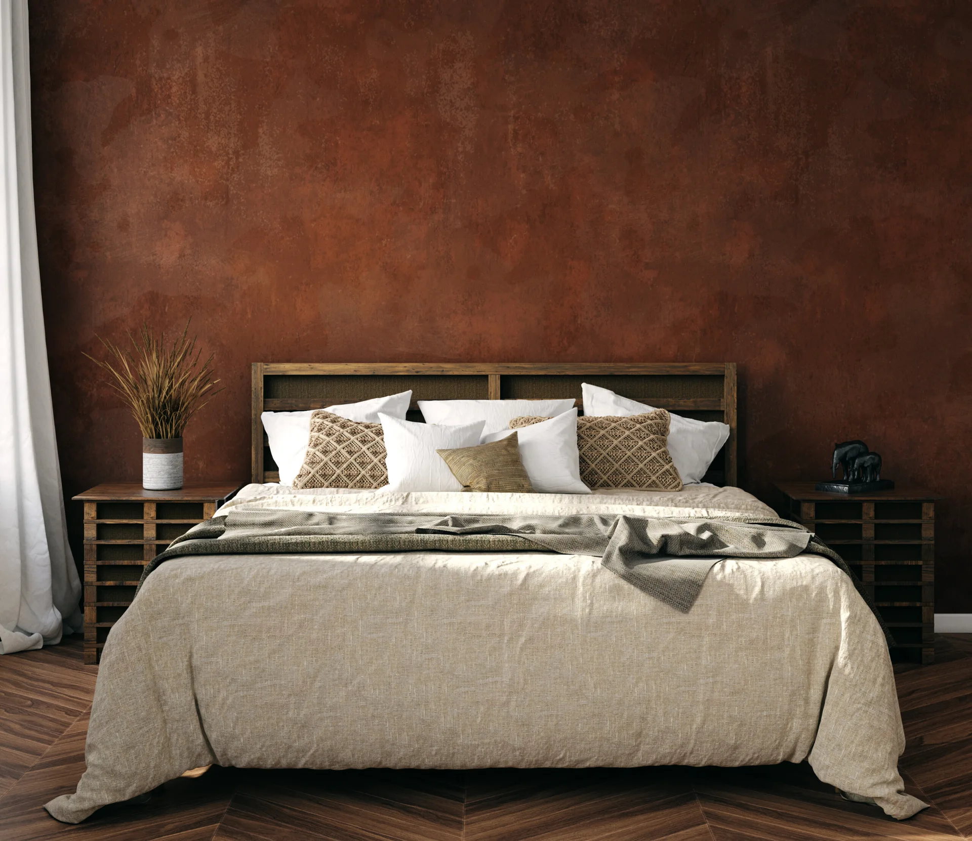 A wooden bed with neutral linen bedding sits against a textured rust-colored accent wall in a bedroom with dark herringbone wood floors.