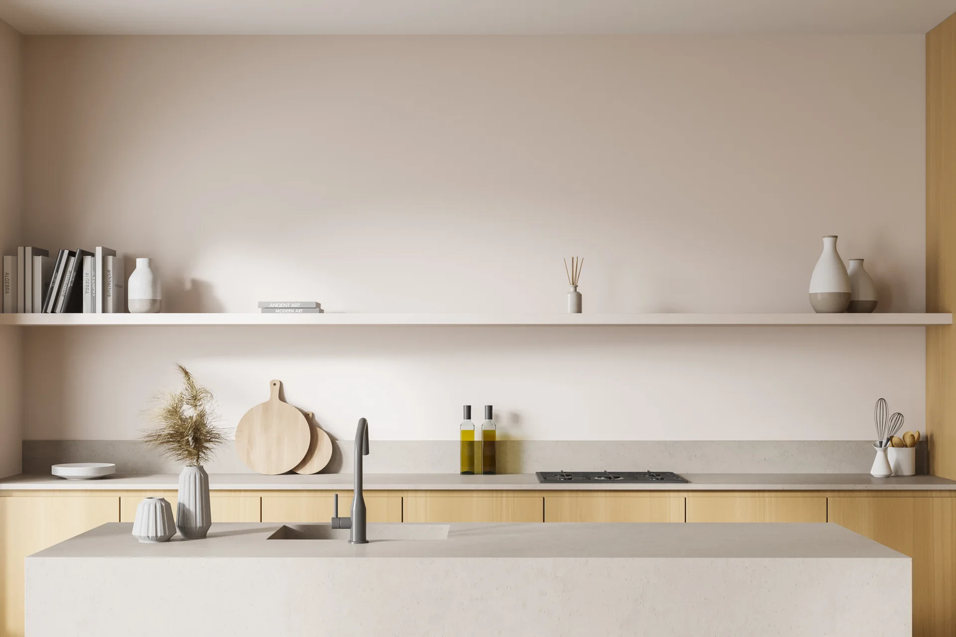 Minimalist kitchen featuring light wood lower cabinets, a stone island with a dark faucet, and a long beige floating shelf on a neutral wall.