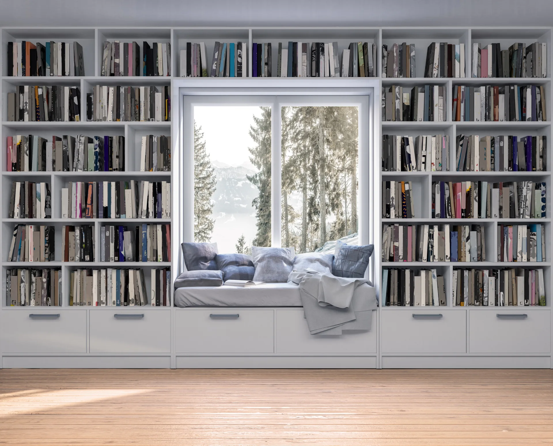 White floor-to-ceiling bookshelves frame a central window seat with blue pillows, overlooking a forest view above light hardwood flooring.