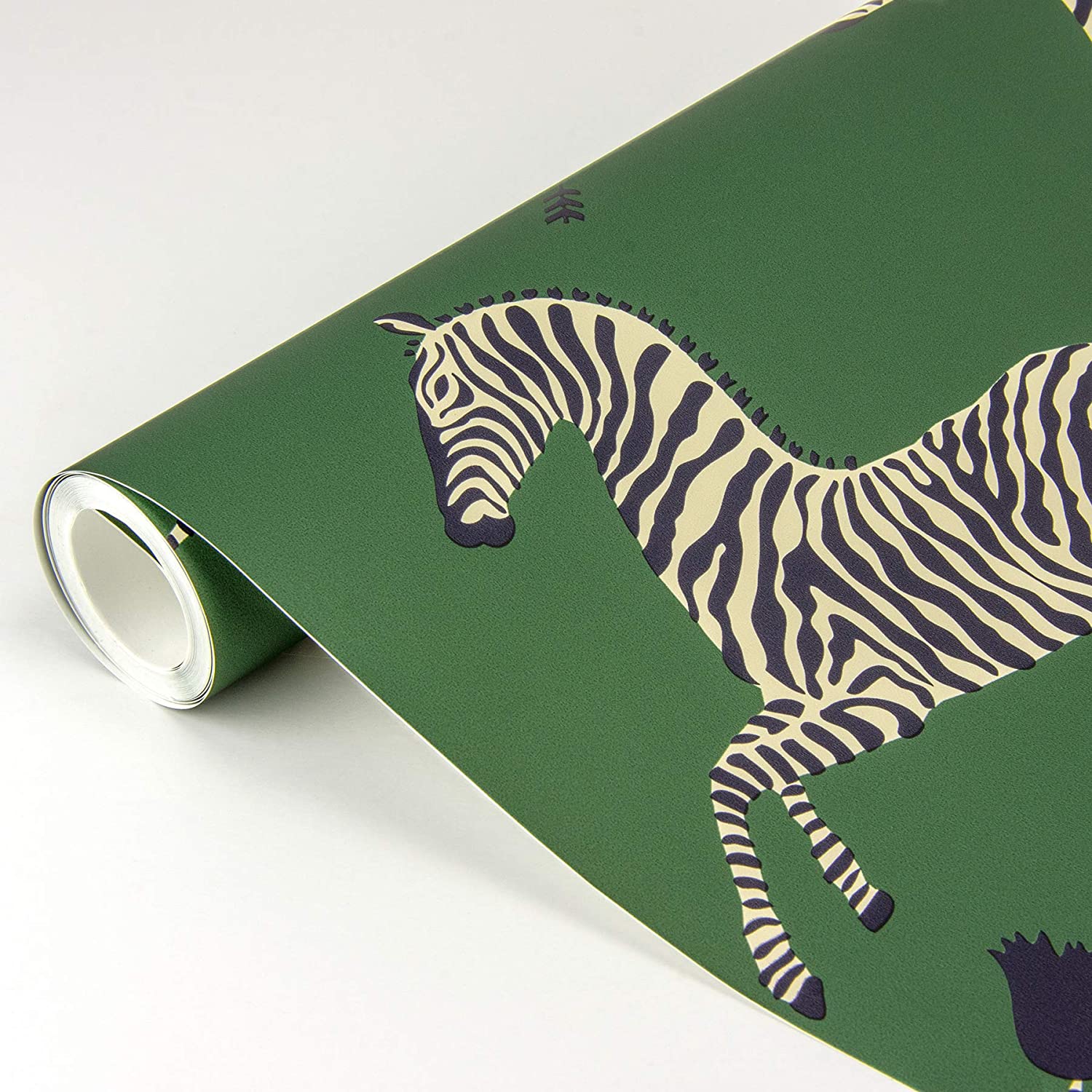 A rolled-up sheet of matte forest green wallpaper featuring an illustrated cream and dark blue zebra design.