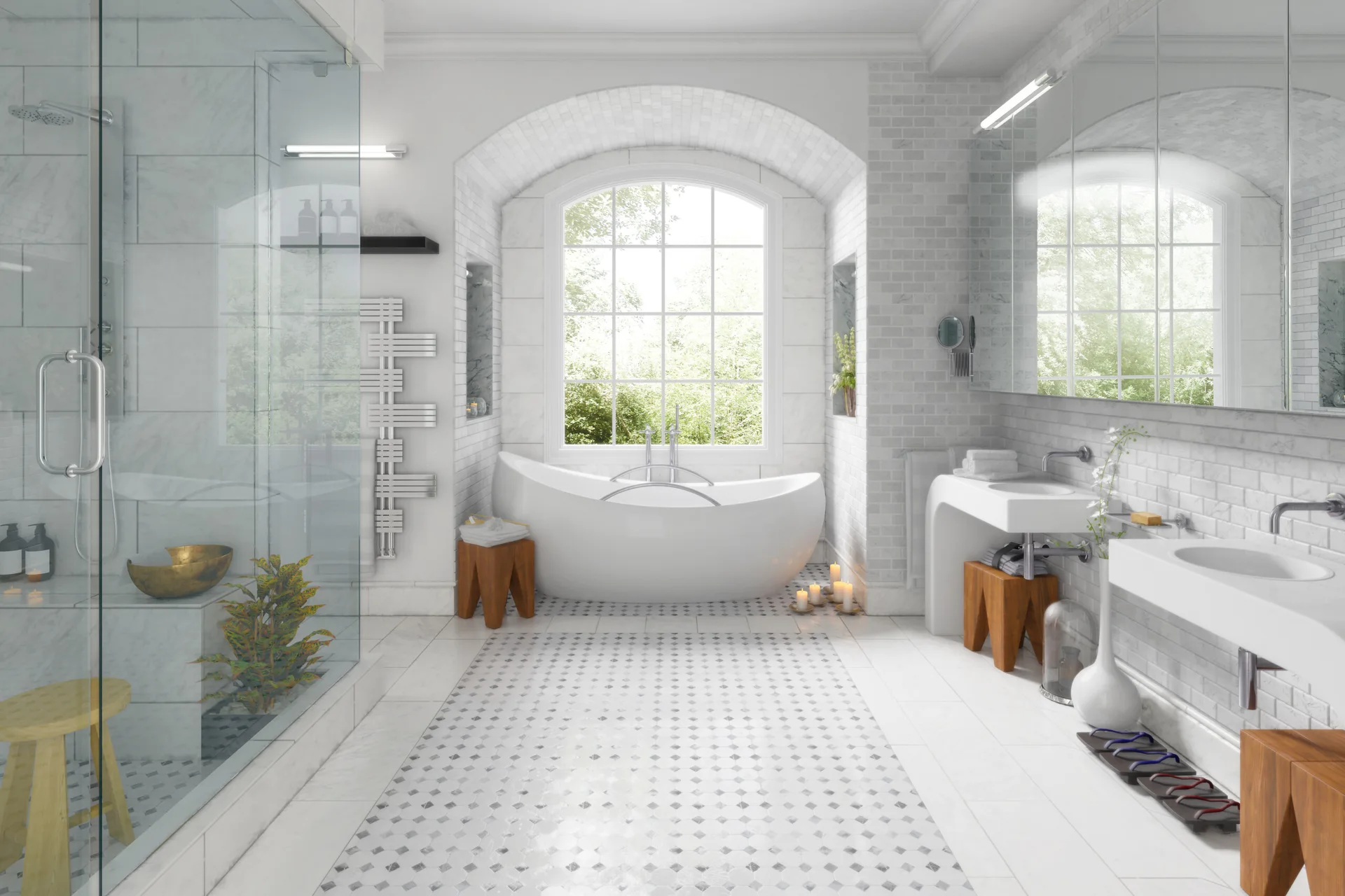 A spacious white bathroom features a centrally placed freestanding tub beneath a large arched window, a glass shower, and wall-mounted double sinks.