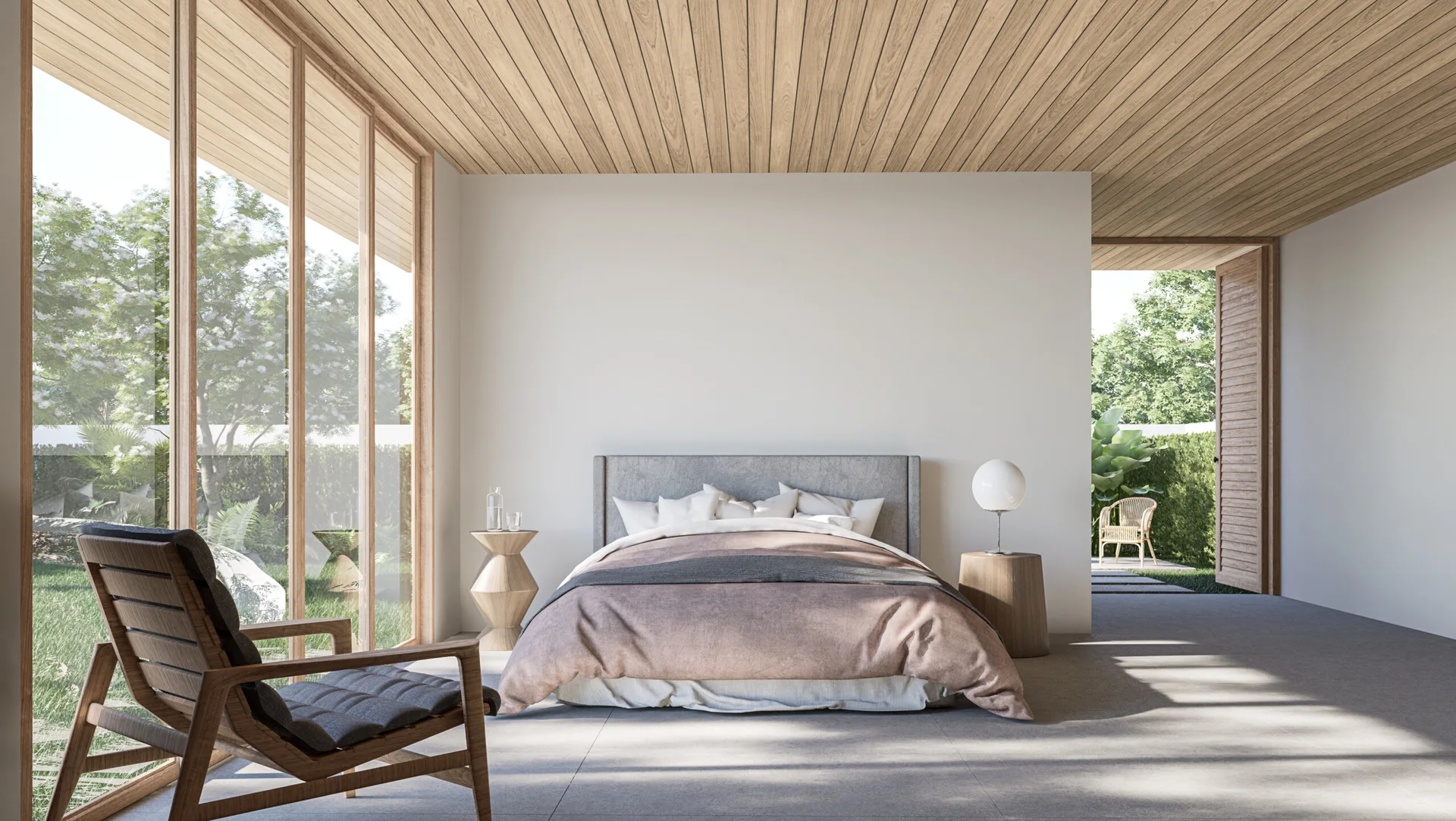 A minimalist bedroom features an upholstered bed, mismatched wooden side tables, a wood plank ceiling, and floor-to-ceiling windows looking onto a garden.