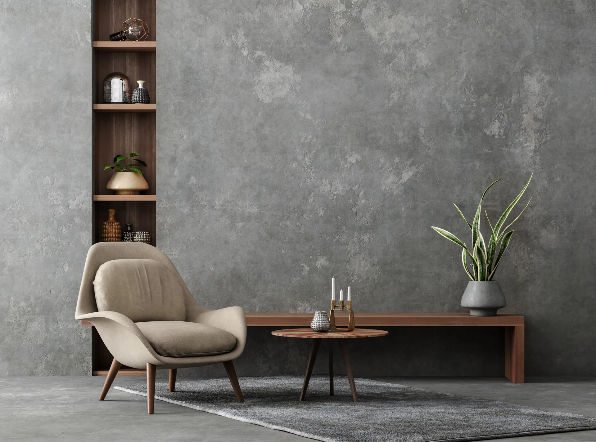 A beige upholstered armchair sits on a grey rug in front of a textured plaster wall featuring a recessed wood shelving unit and low console bench.
