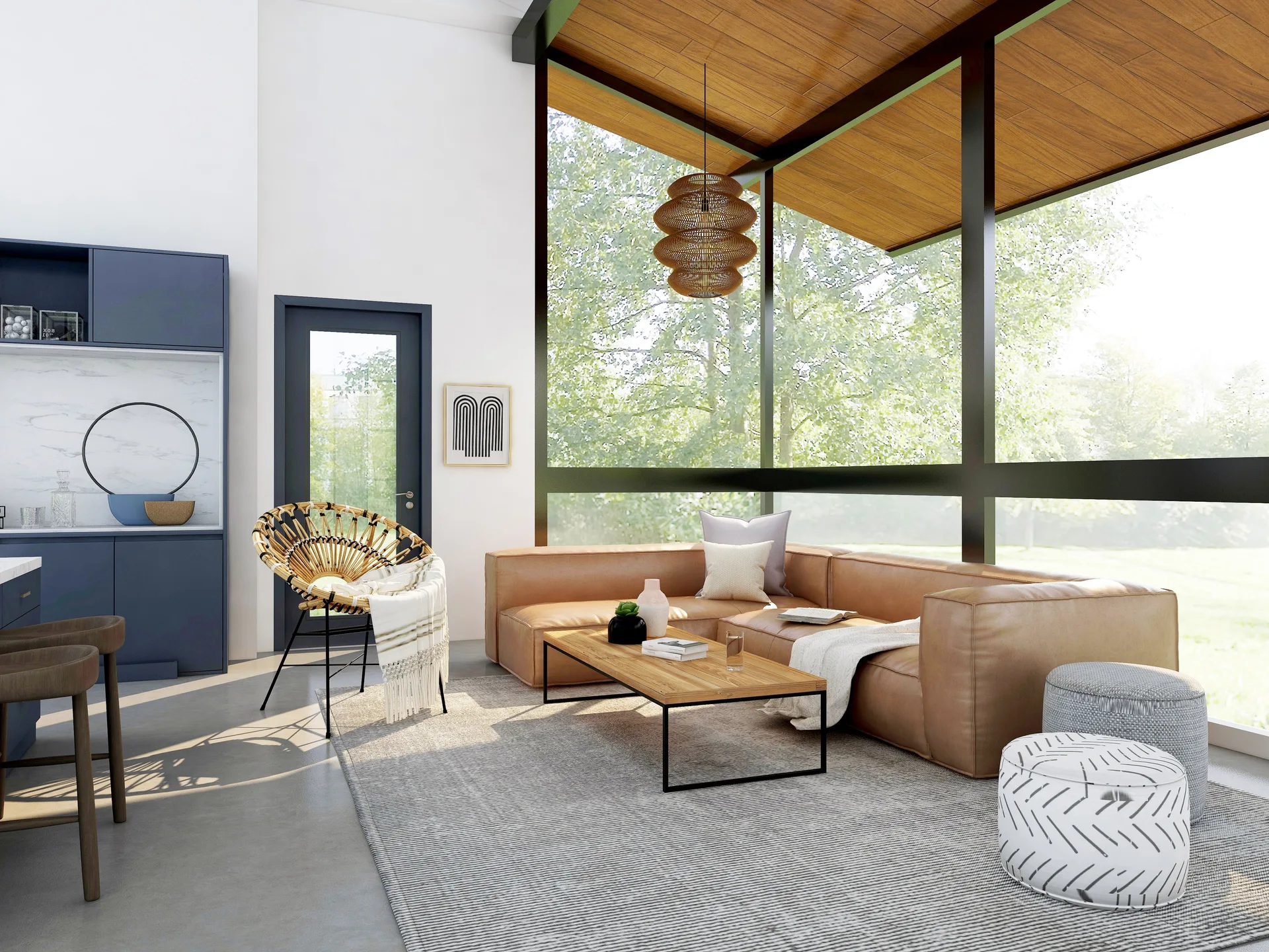 A modern living room features a tan leather sectional sofa, a wood-topped coffee table, and large windows looking out at green trees.