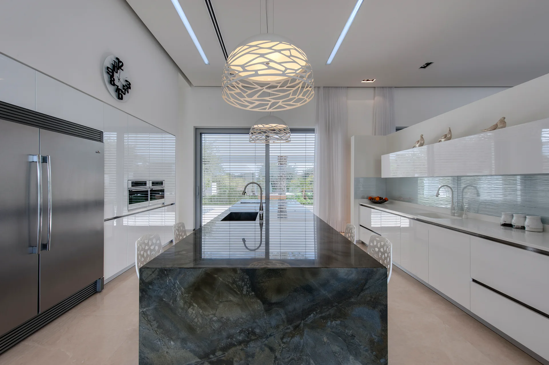 House in Shfela, Hila Israelevitz Architects, Lighting, Countertop, Chair, Glass
