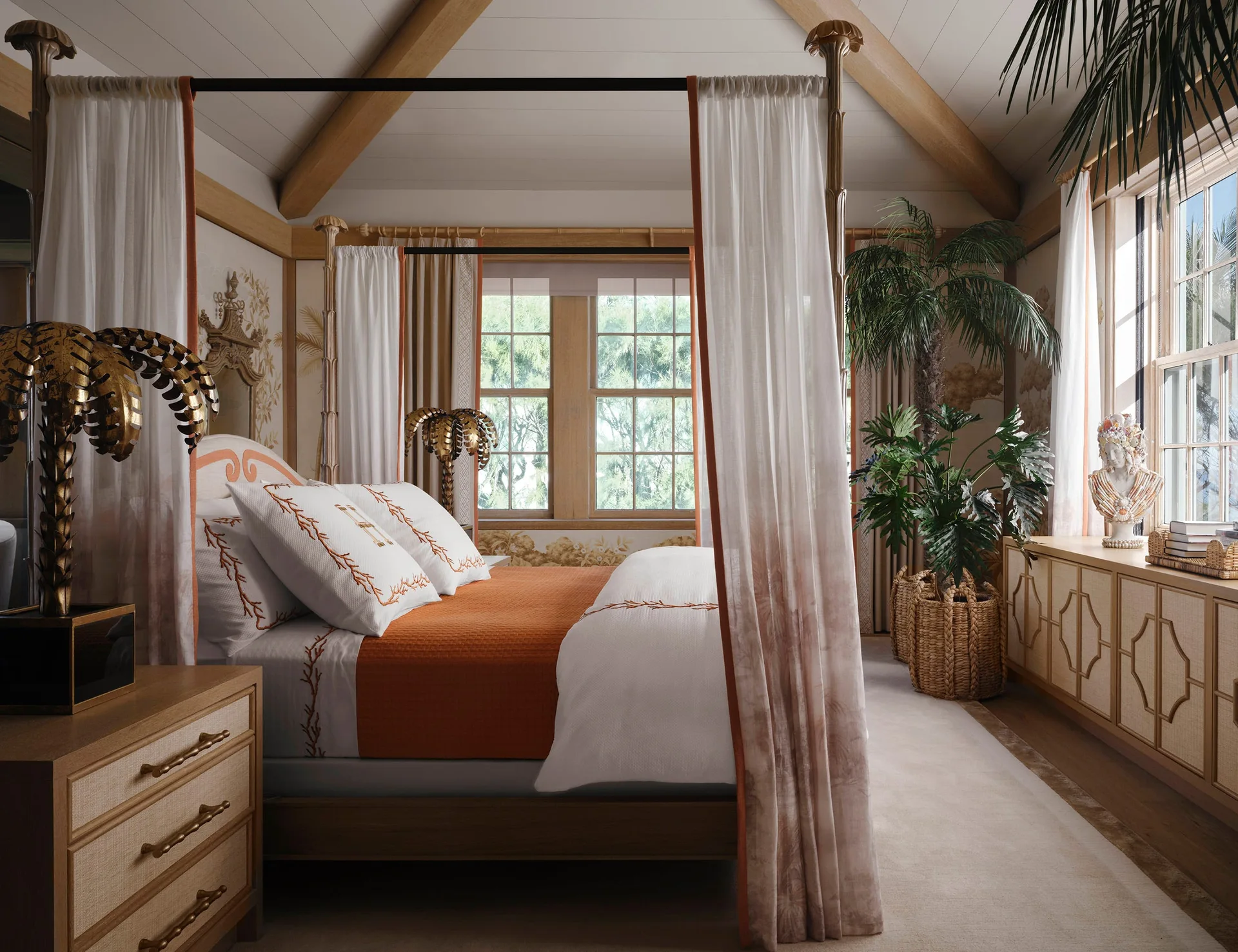 A bedroom features a wooden four-poster bed with terracotta bedding, a vaulted ceiling with exposed wood beams, and potted palm plants.