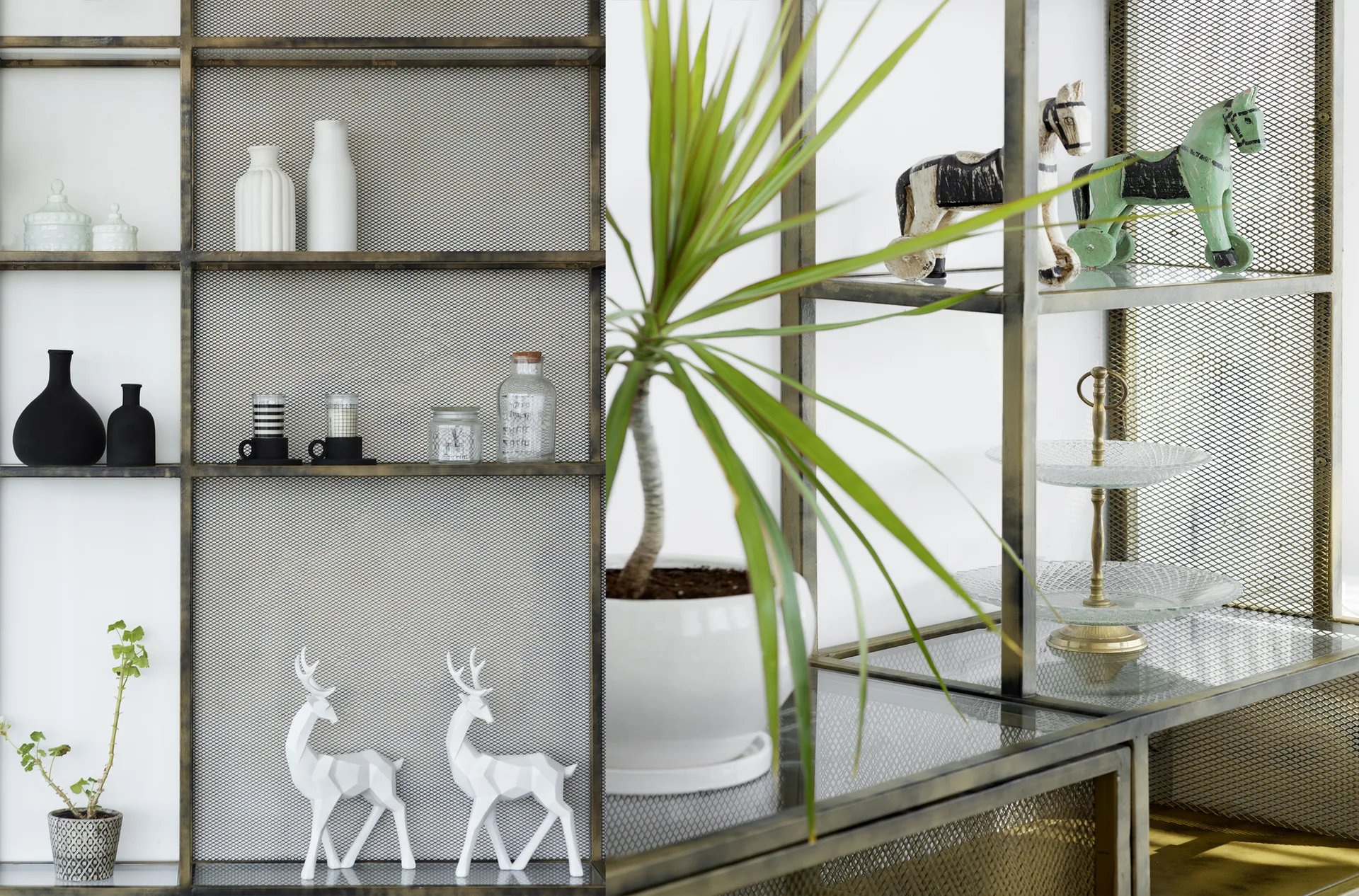 A bronze metal open shelving unit with mesh back panels displays white and black ceramic vessels, toy horses, and a green potted plant.
