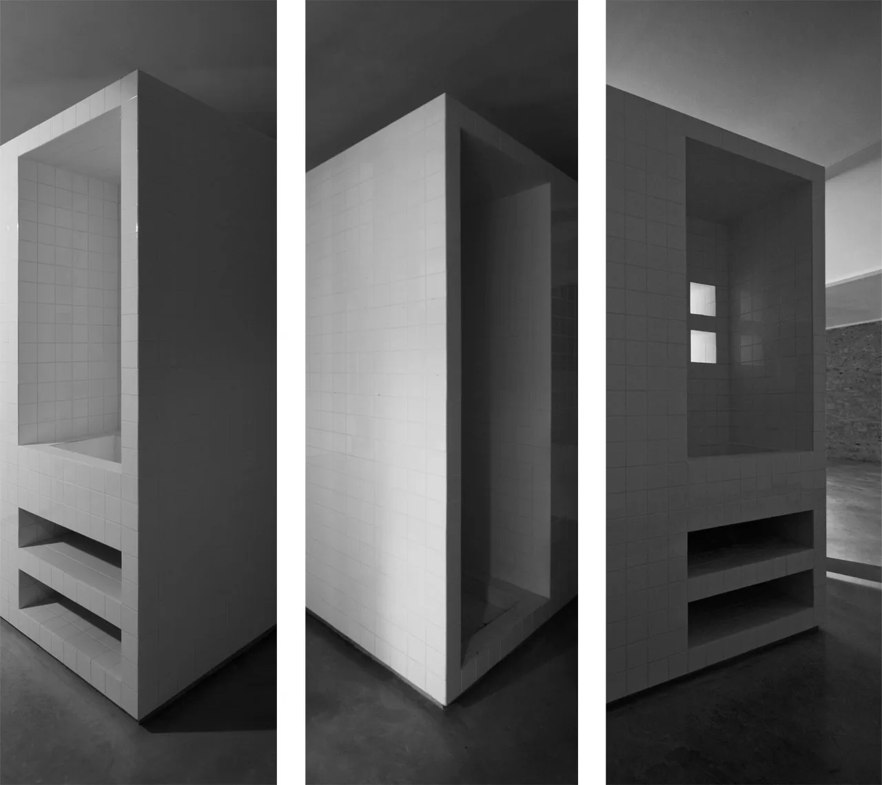 A triptych showing three views of a freestanding white-tiled bathroom structure with recessed shelves and integrated alcoves on a concrete floor.