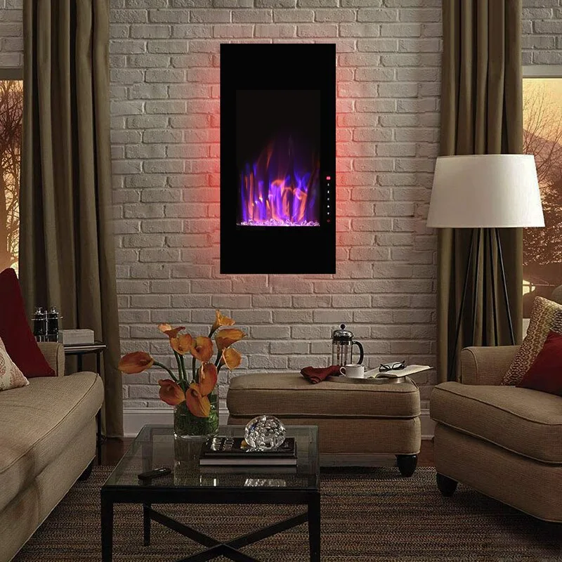 A living room features a vertical black electric fireplace mounted on a white brick wall between beige sofas and drapery.