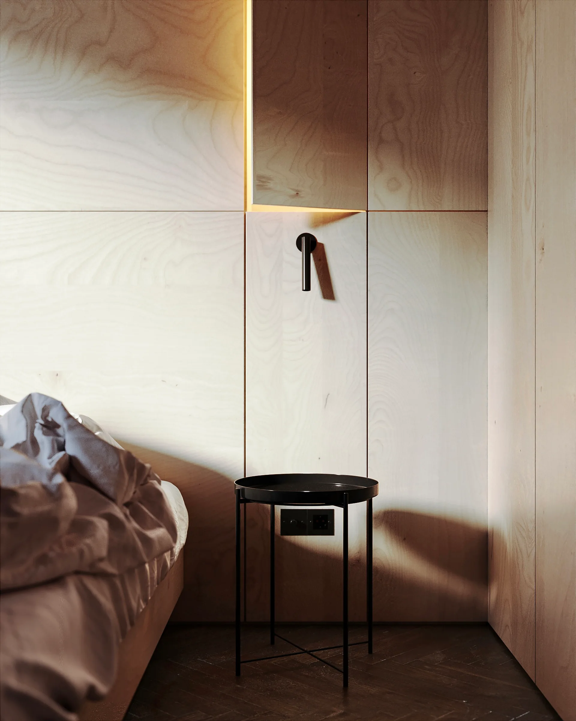 A minimalist bedroom corner features light plywood wall panels with integrated indirect lighting, a black metal side table, and a wall lamp.