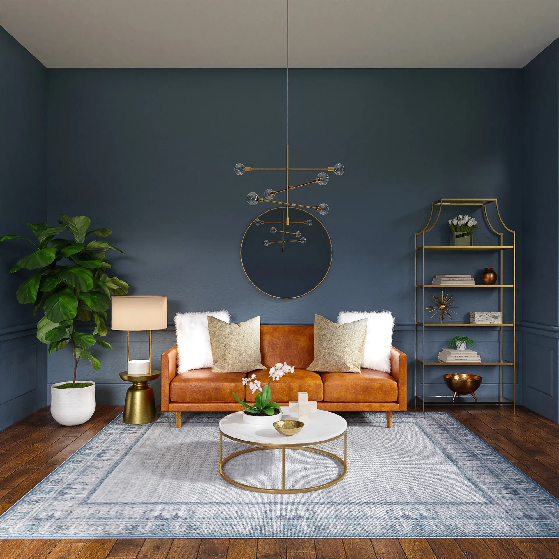 A living room features a cognac leather sofa against a dark blue wall, with a round marble coffee table and gold shelving.