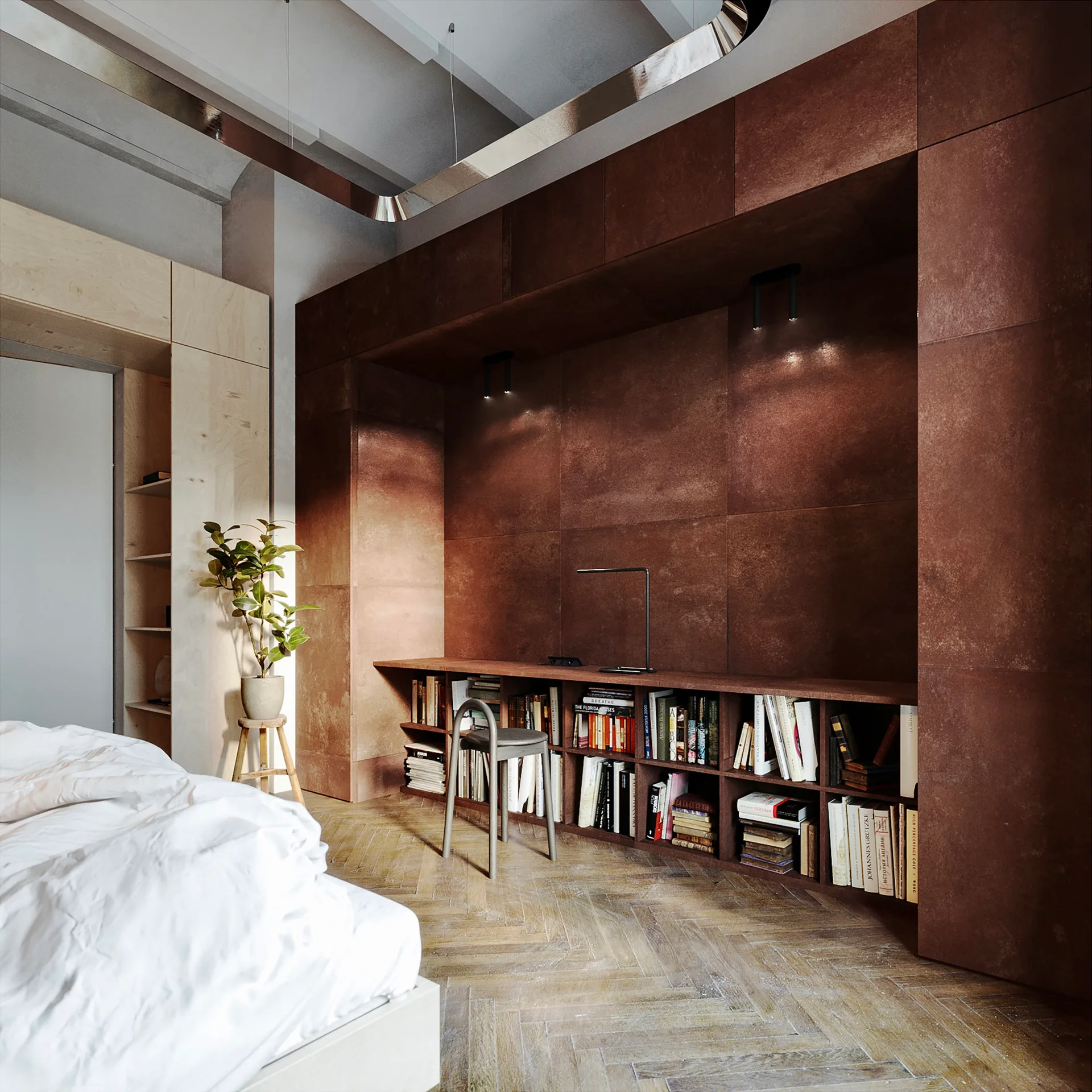 A bedroom features a rust-colored built-in wall unit with an integrated desk, bookshelf, and a grey chair on a herringbone wood floor.